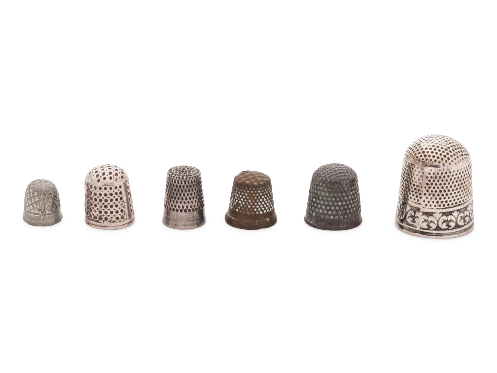 Six Silver and Mixed Metal Thimbles
