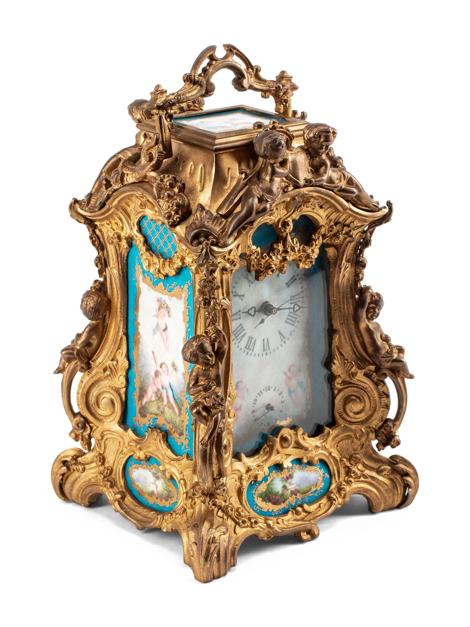 A Gilt Bronze and Sèvres Style Porcelain Carriage Clock
