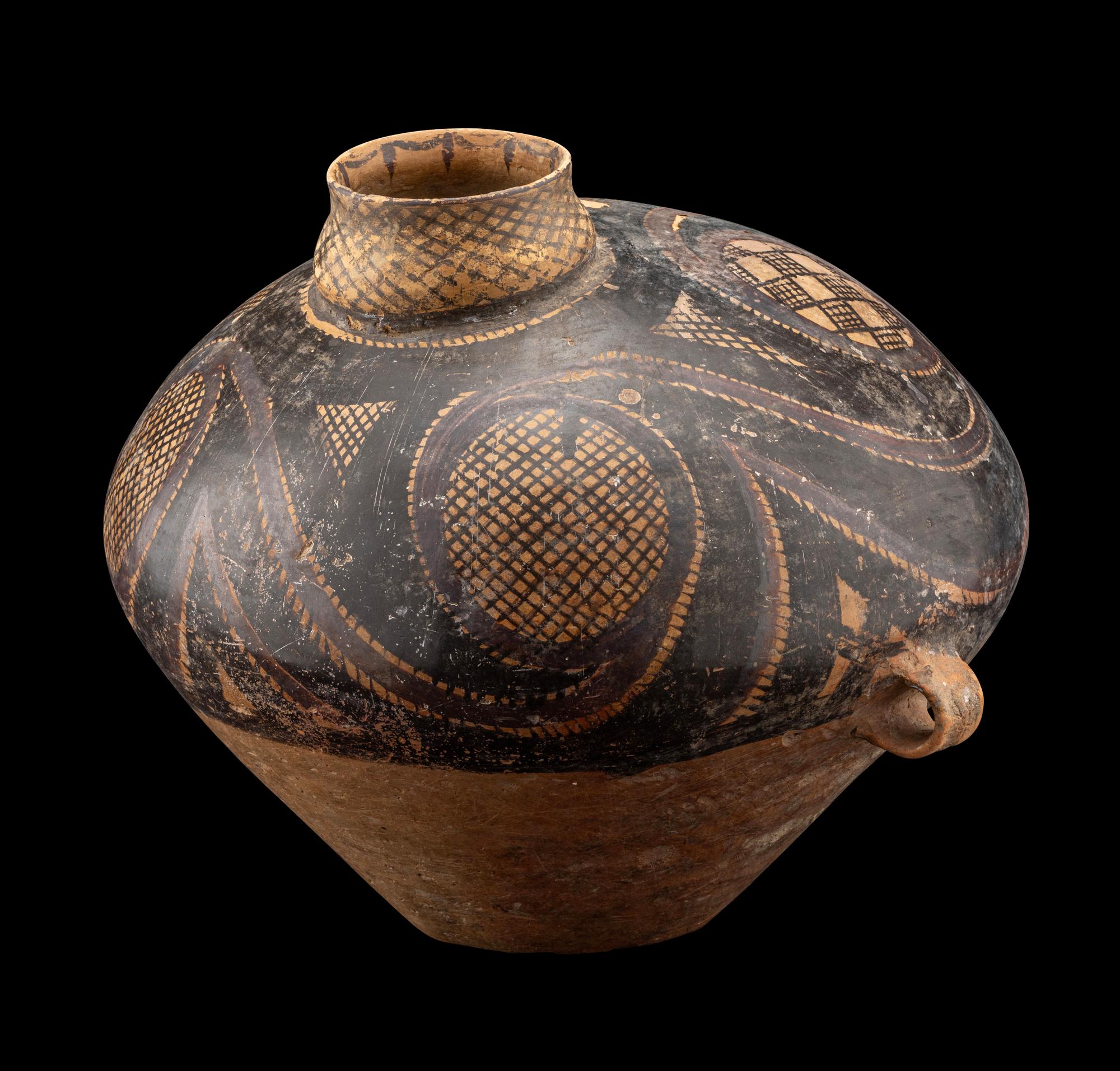 A Chinese Painted Pottery Handled Jar