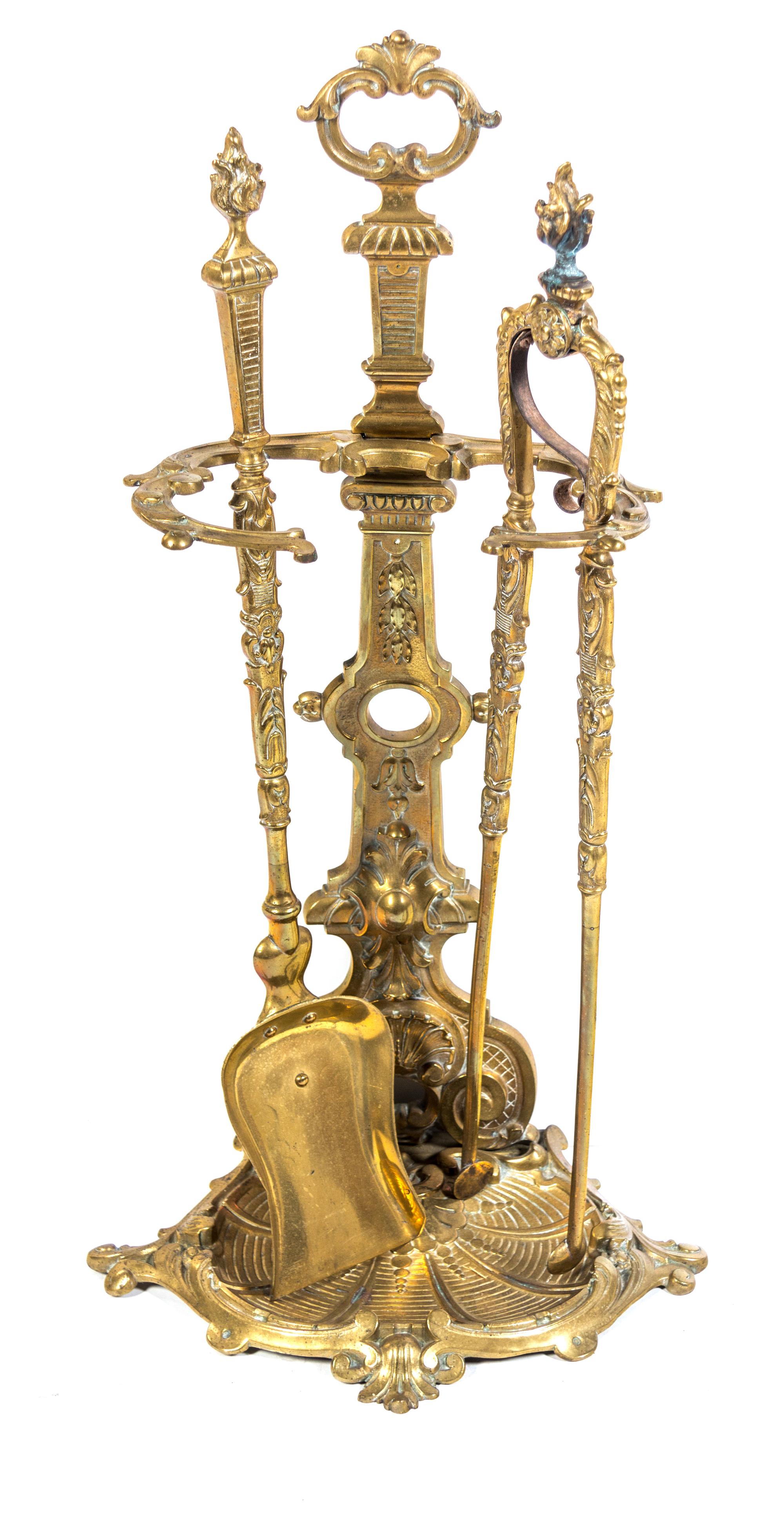 A Louis XV Style Brass Fire Fender and Fireplace Tools on Stand Width of fender 53 inches. — EARLY 20TH CENTURY