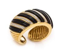 An 18 Karat Yellow Gold, Platinum, Diamond and Onyx Cuff Bracelet, Charles Turi, 85.45 dwts.