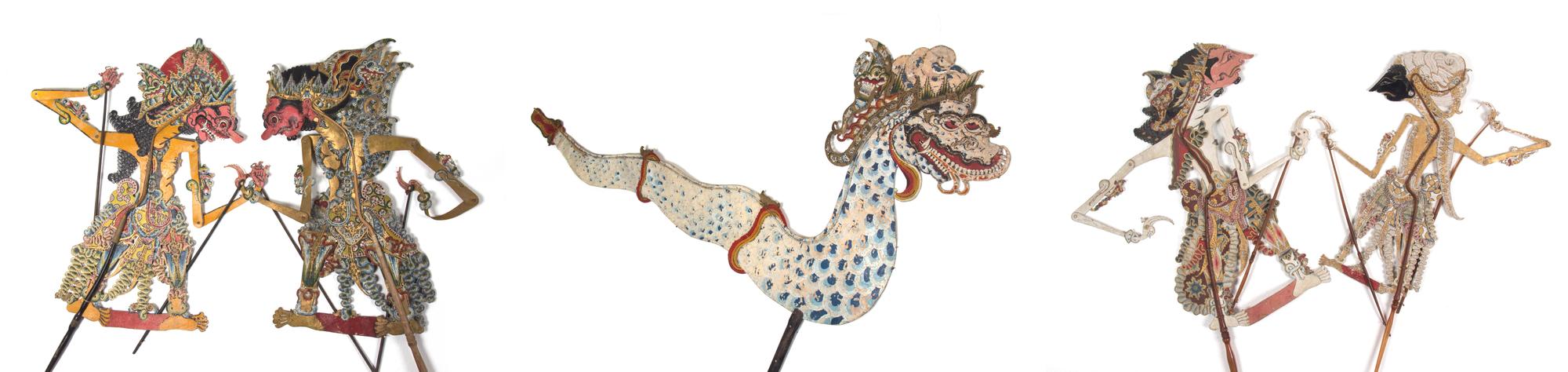 A Collection of Five Indonesian Wayang Kulit Shadow Puppets Height of tallest 31 inches.