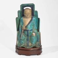 A Chinese turquoise and blue glazed figure of a seated Luohan 松石绿地罗汉坐像 Late Ming to early Qing dynasty ??????