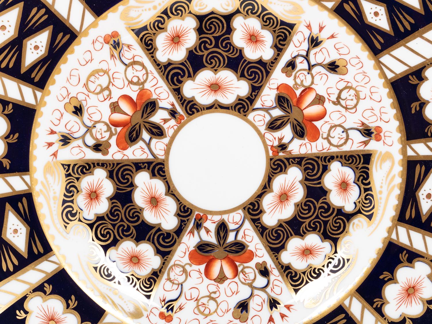 A Royal Crown Derby Traditional Imari Porcelain Dinner Service