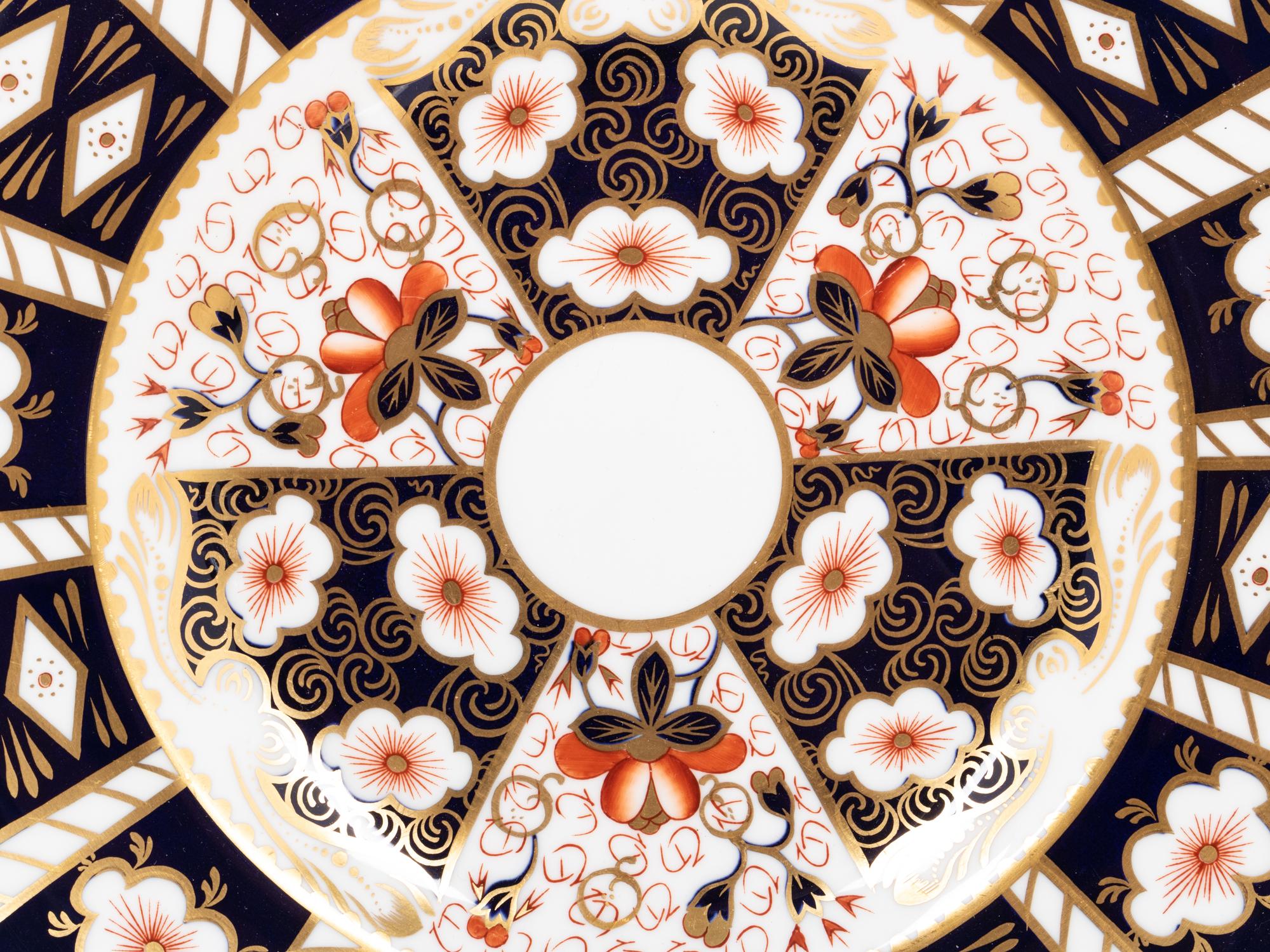 A Royal Crown Derby Traditional Imari Porcelain Dinner Service
