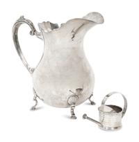 An American Fisher Sterling Silver Water Pitcher and A Cartier Sterling Silver Novelty Model of a Watering Can