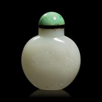 A Chinese Carved White Jade Snuff Bottle, 19th Century