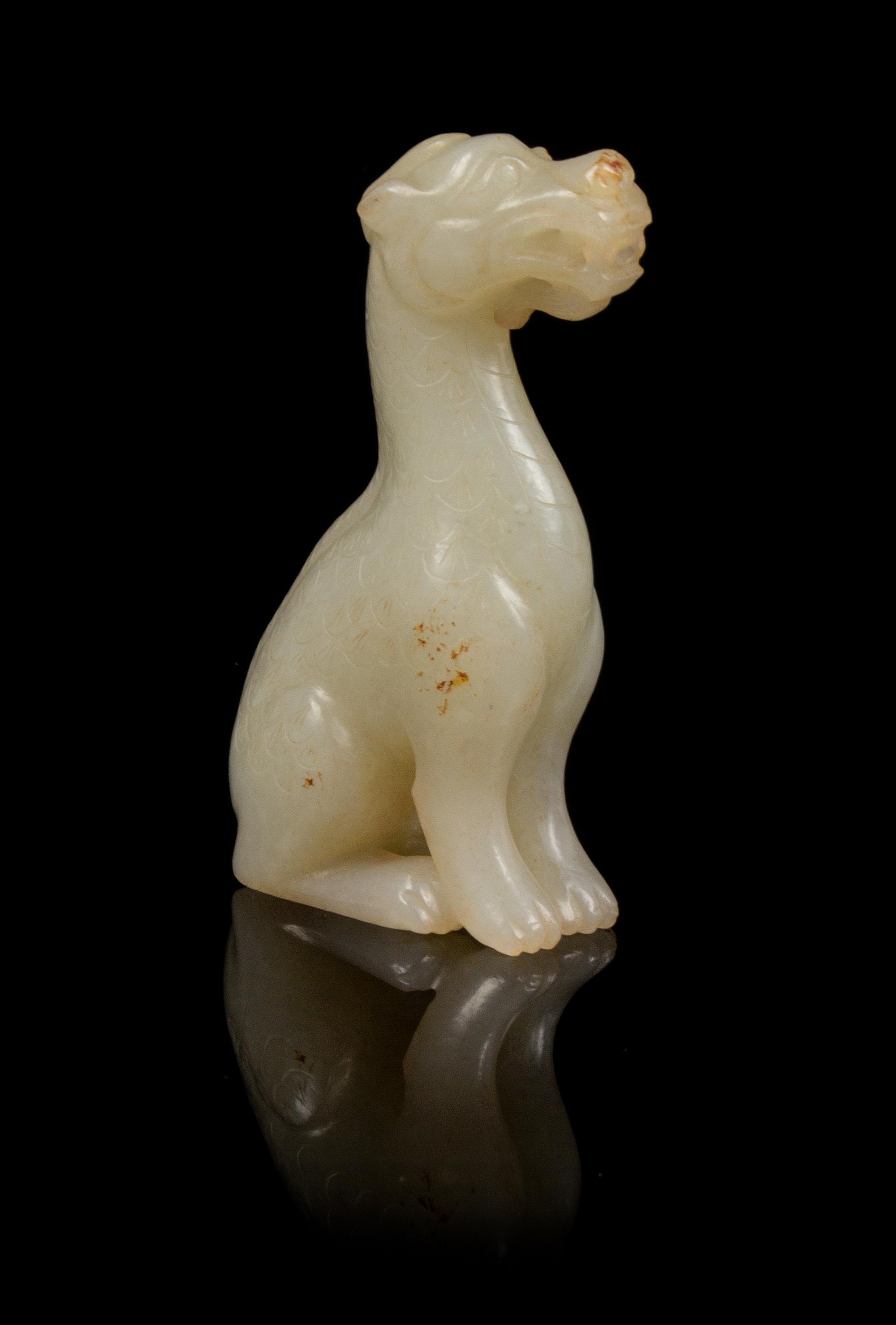A Jade Toggle Height 2 3/4 inches.
