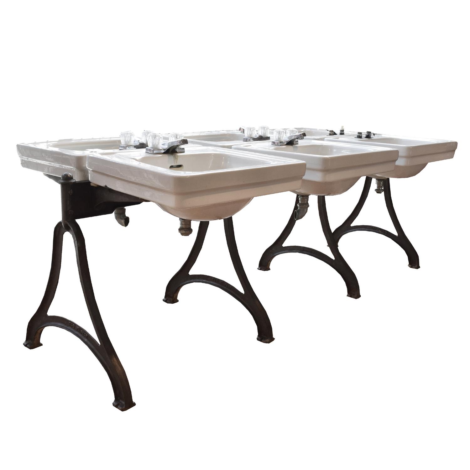 A Double-Sided Porcelain and Iron Six Basin Sink 41" W x 80" D x 31" H — United States, Circa 1930