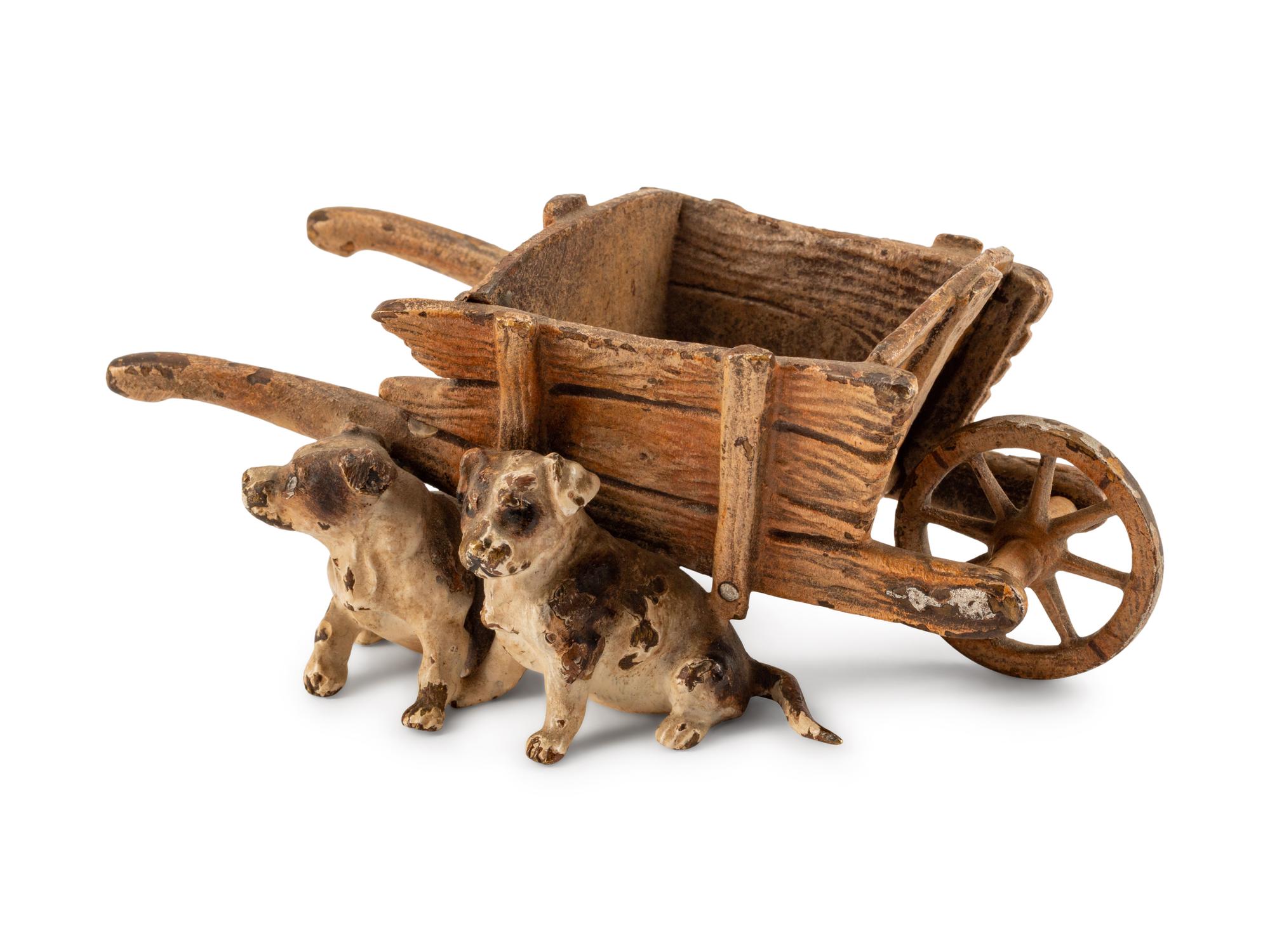 An Austrian Cold-Painted Group of Dogs and a Wheelbarrow — EARLY 20TH CENTURY