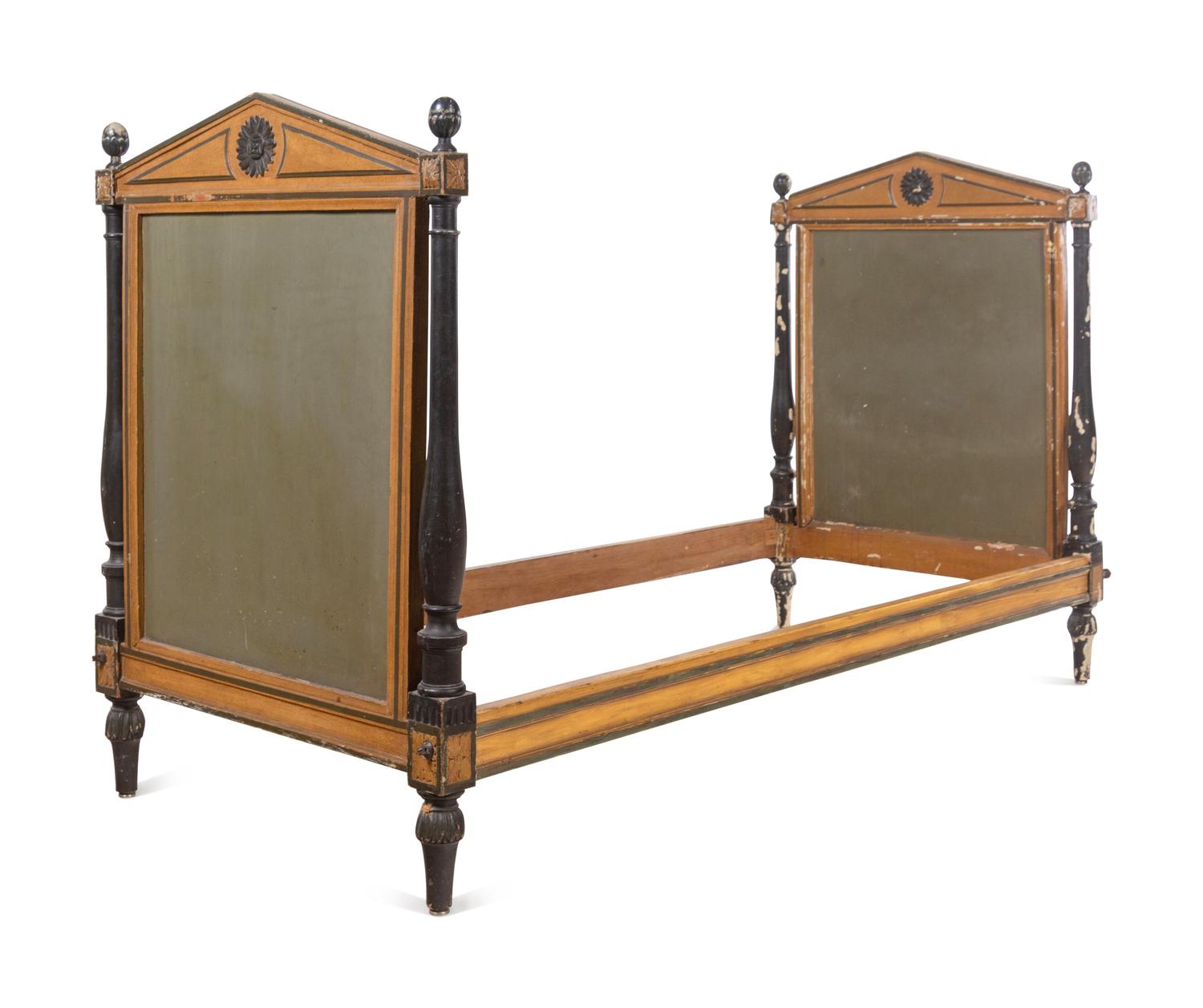 A Pair of Directoire Painted and Parcel Ebonized Daybeds