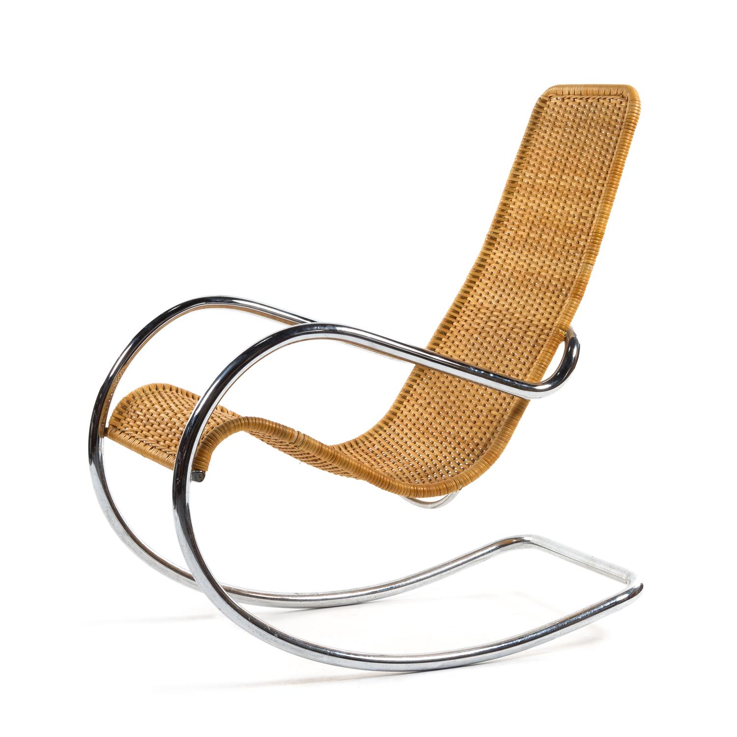 A Chrome-Plated Steel and Rattan Rocking Chair Height 42 x width 22 inches. — STYLE OF LUDWIG MIES VAN DER ROHE
