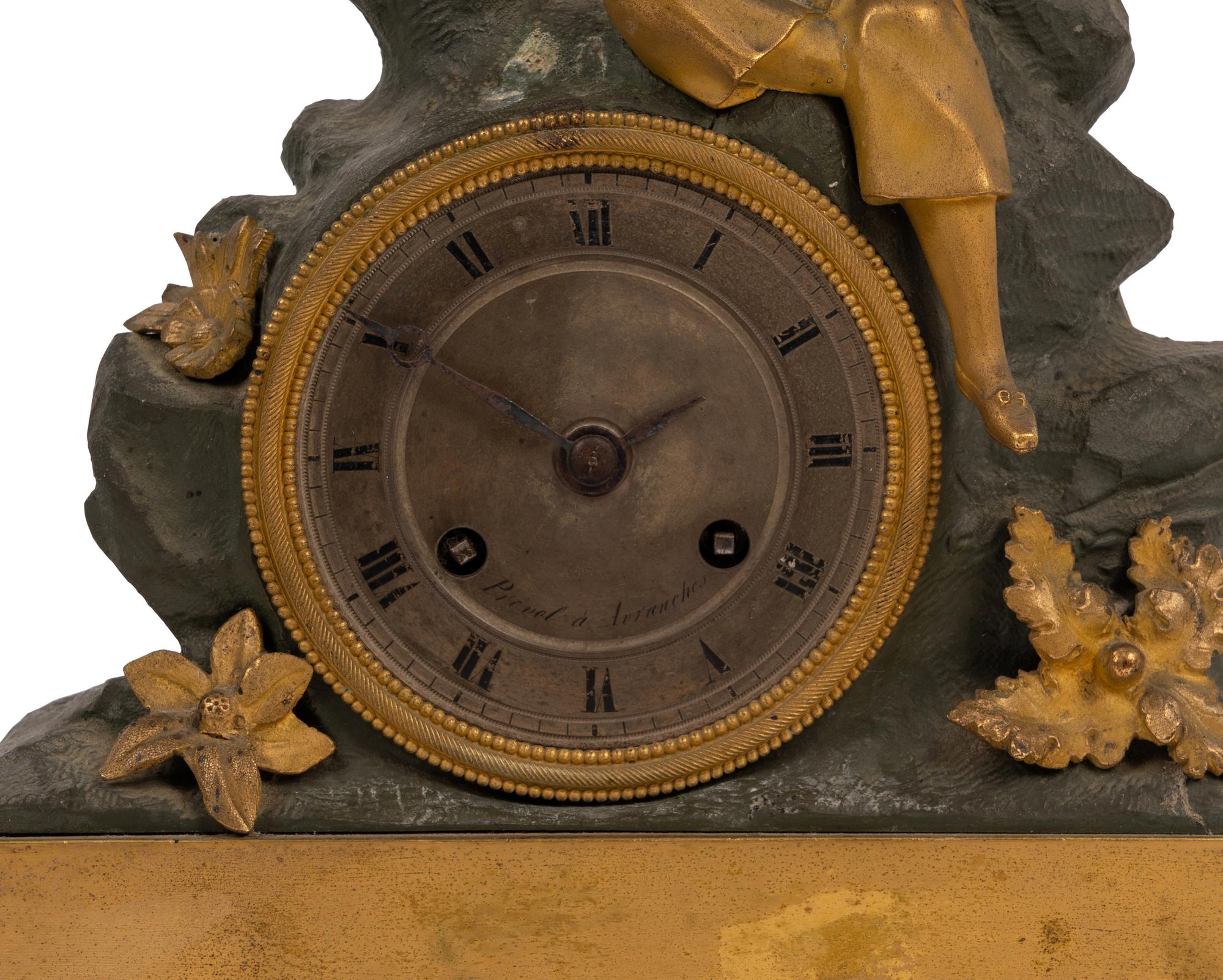 A Charles X Gilt and Patinated Bronze Figural Mantel Clock