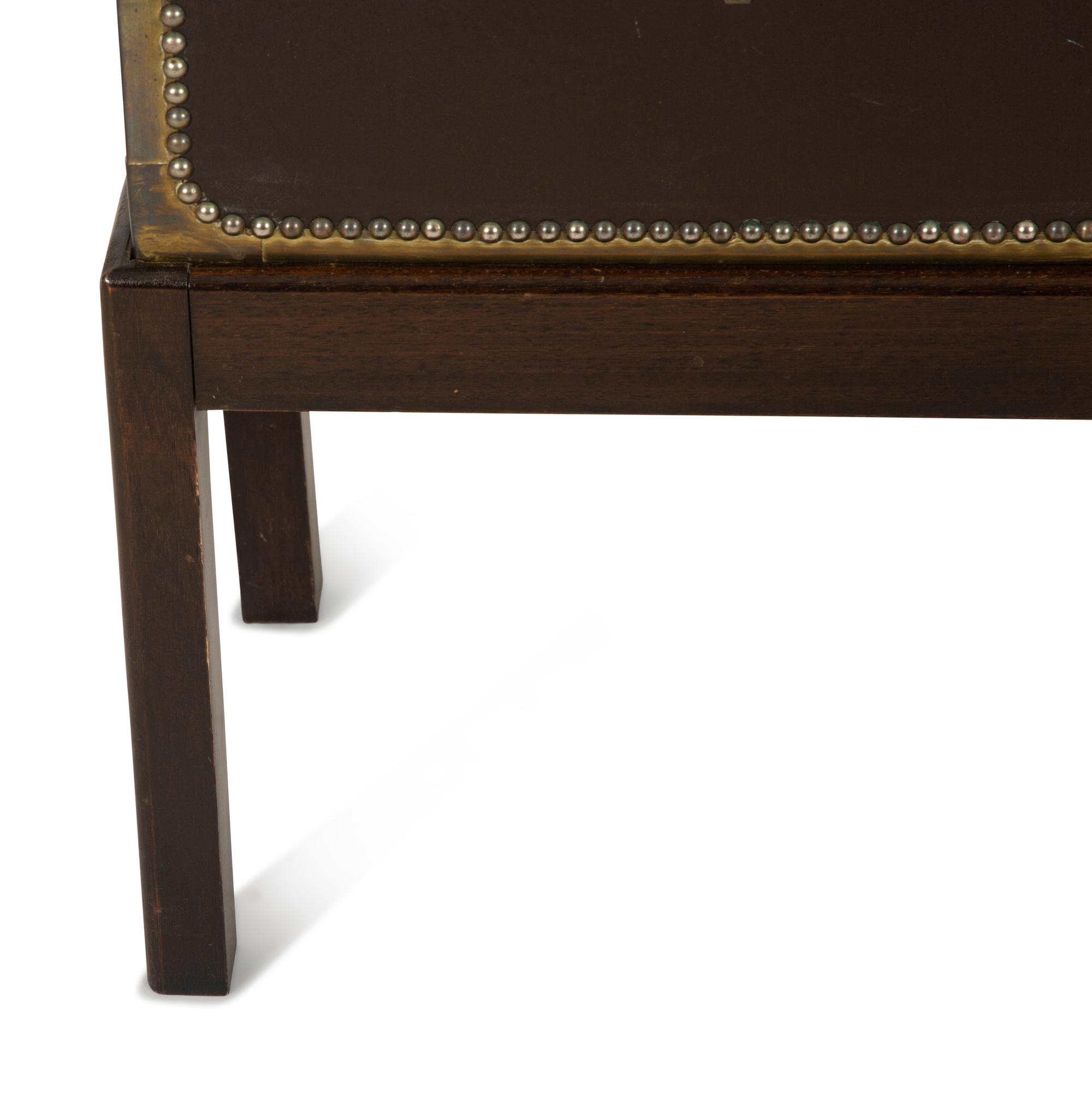 An English Brass Bound Leather Box with Brass Nailhead Trim on a Fitted Mahogany Stand