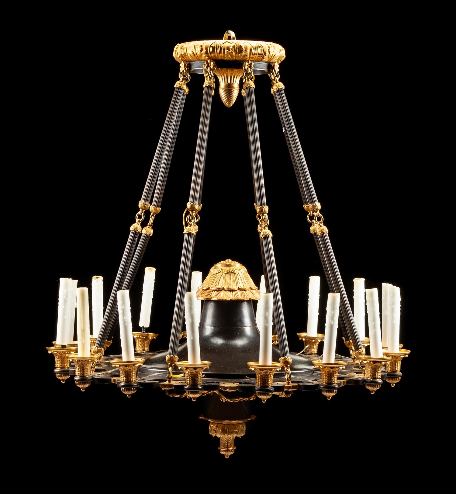 An Empire Gilt and Patinated Bronze Eighteen-Light Chandelier Height 40 x diameter 34 inches. — 19TH CENTURY
