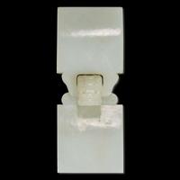 Two Chinese white jade buckles and a third buckle 白玉帶鉤兩組及一配件 Qing dynasty ?