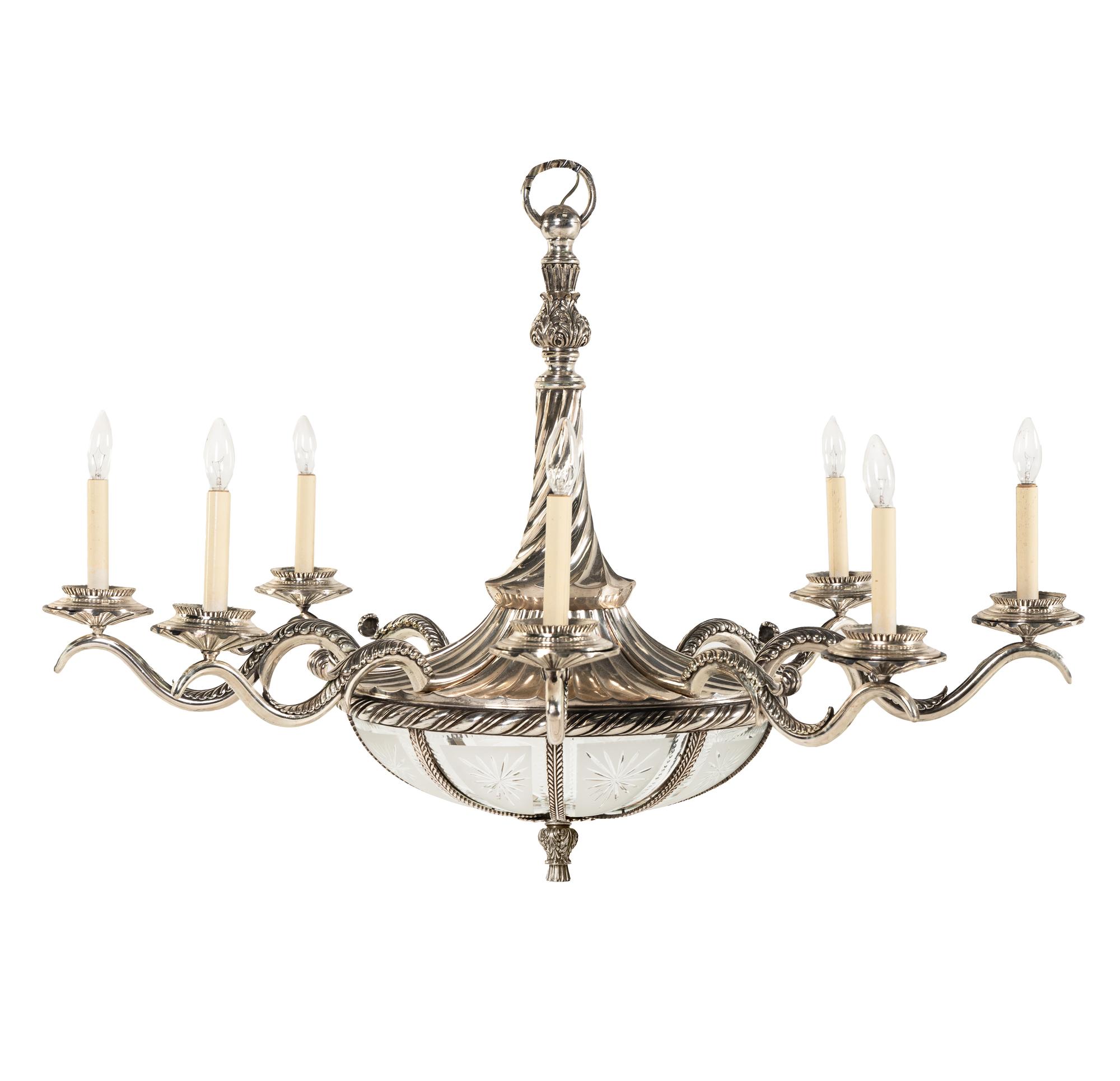 A Continental Silvered Bronze and Frosted Glass Eight-Light Chandelier