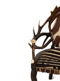 A Pair of Stag Antler Arm Chairs with Zebra Hide Upholstery Attributed to Anthony Redmile