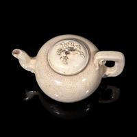A Small Chinese Crackle Glazed Teapot and Cover, Kangxi-Yongzheng Period 清康熙-雍正 或為漳州窯 米黃釉茶壺