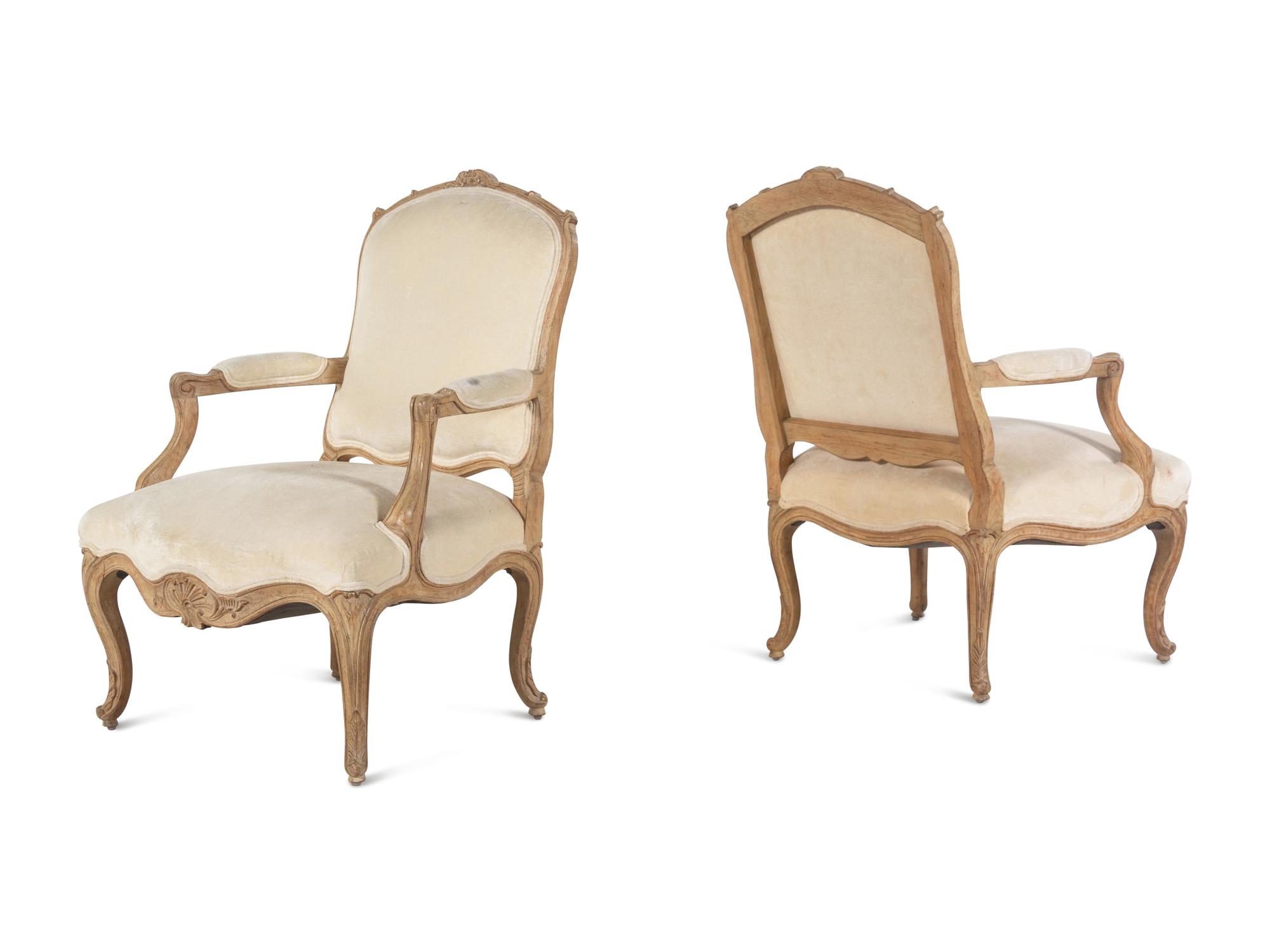 A Pair of Louis XV Style Bleached Wood Fauteuils