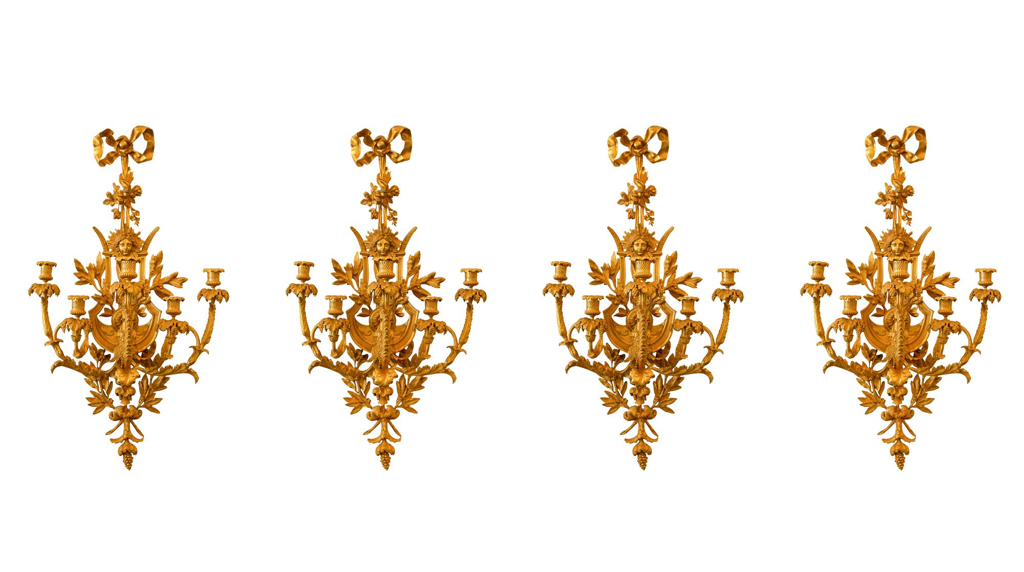 A Set of Four Louis XVI Style Gilt Bronze Five-Light Sconces
