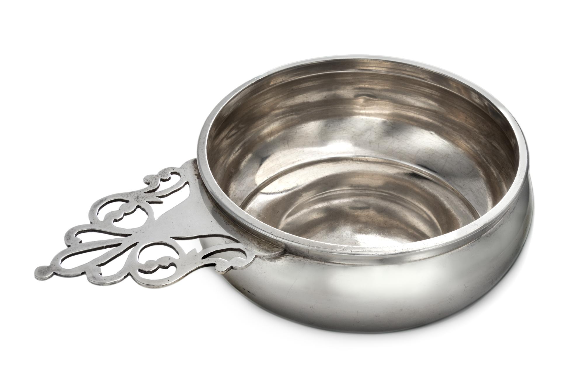 An American Silver Porringer, Currier & Roby, New York, NY, having a pierce decorated handle.