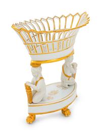 A Paris Porcelain Parcel Gilt Figural Fruit Basket