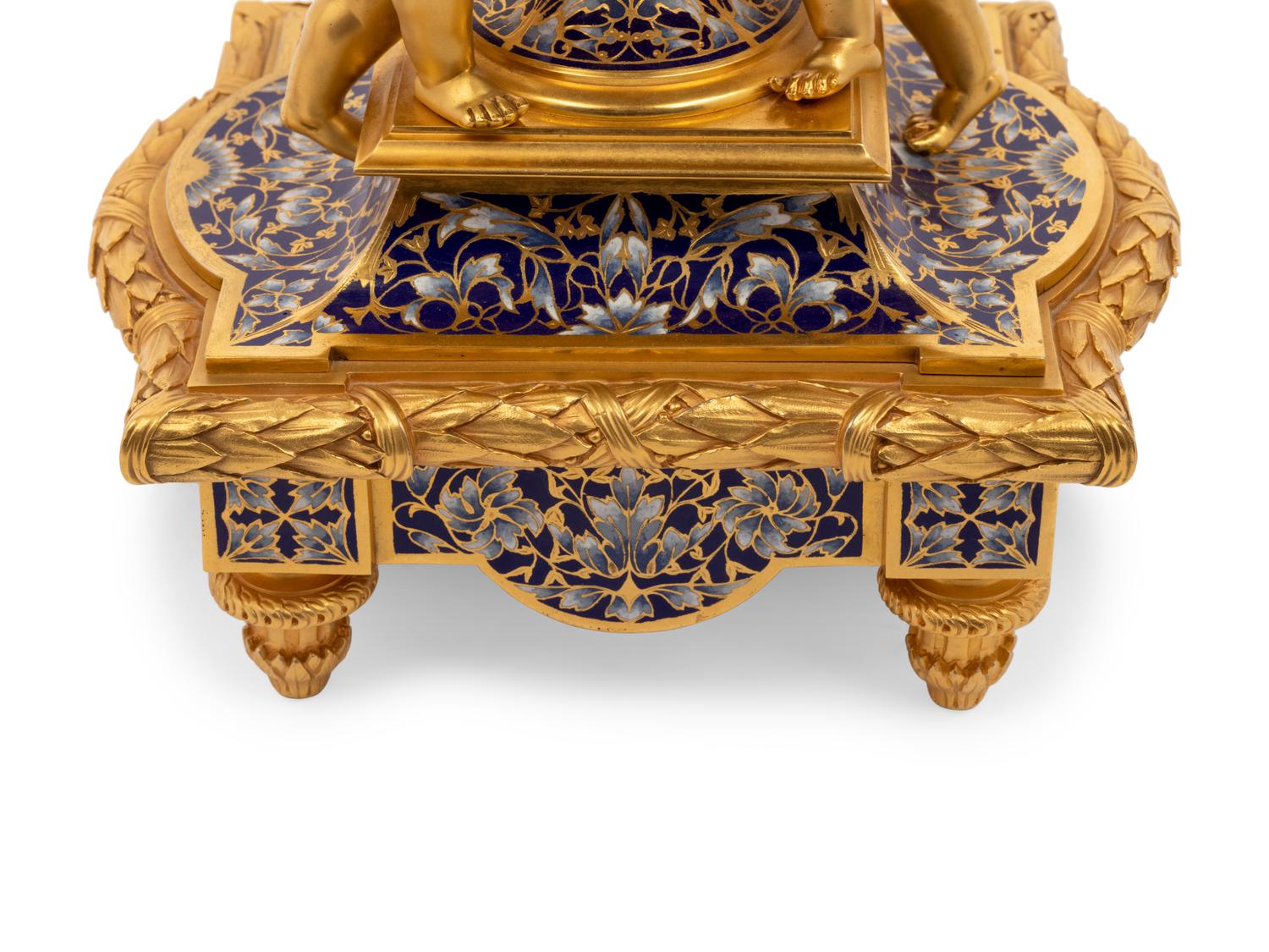 A French Gilt Bronze and Champlevé Clock Garniture Retailed by Tiffany & Co.