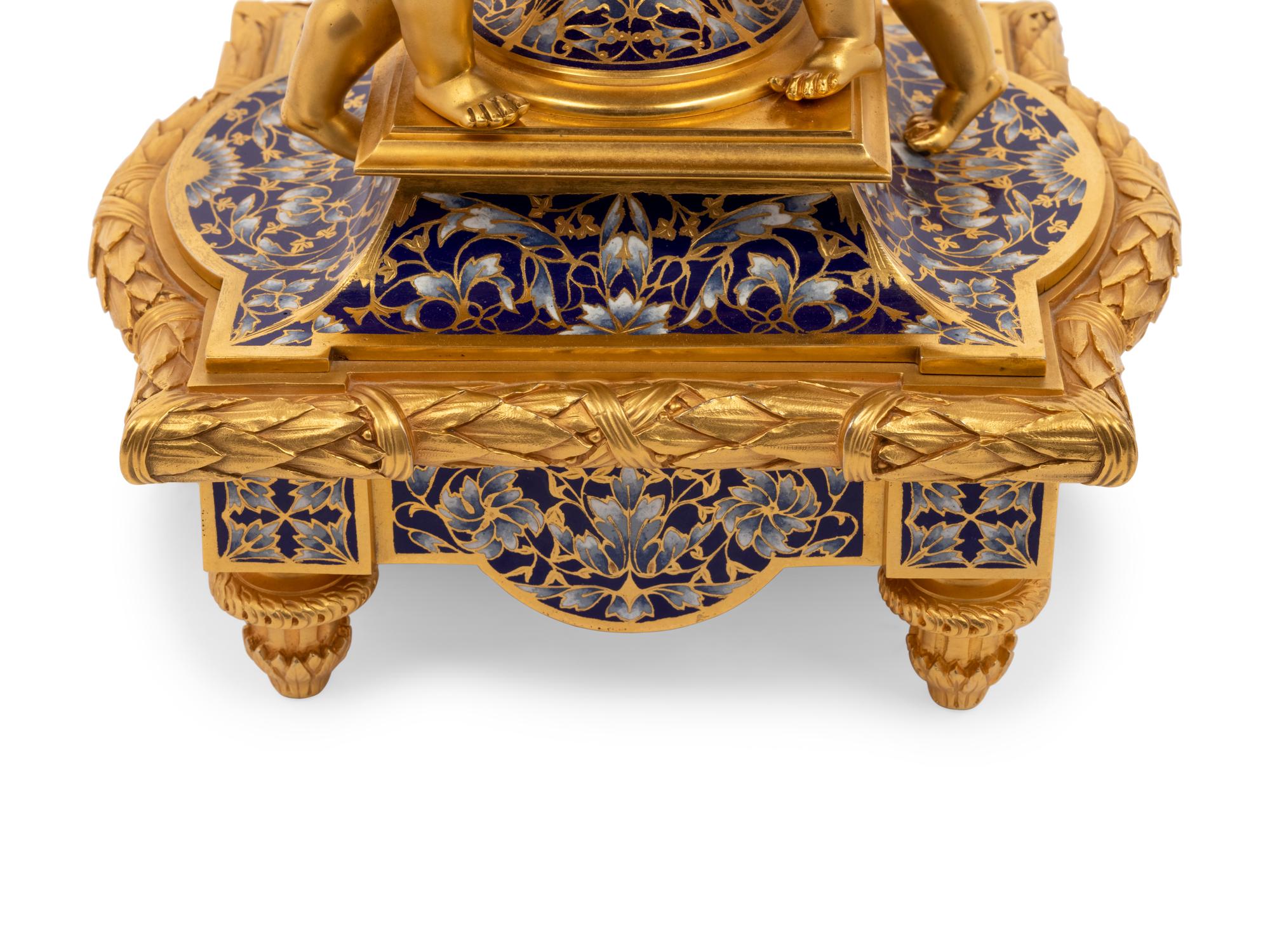 A French Gilt Bronze and Champlevé Clock Garniture Retailed by Tiffany & Co.