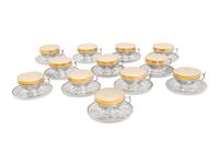 A Set of Twelve American Silver Teacups and Saucers