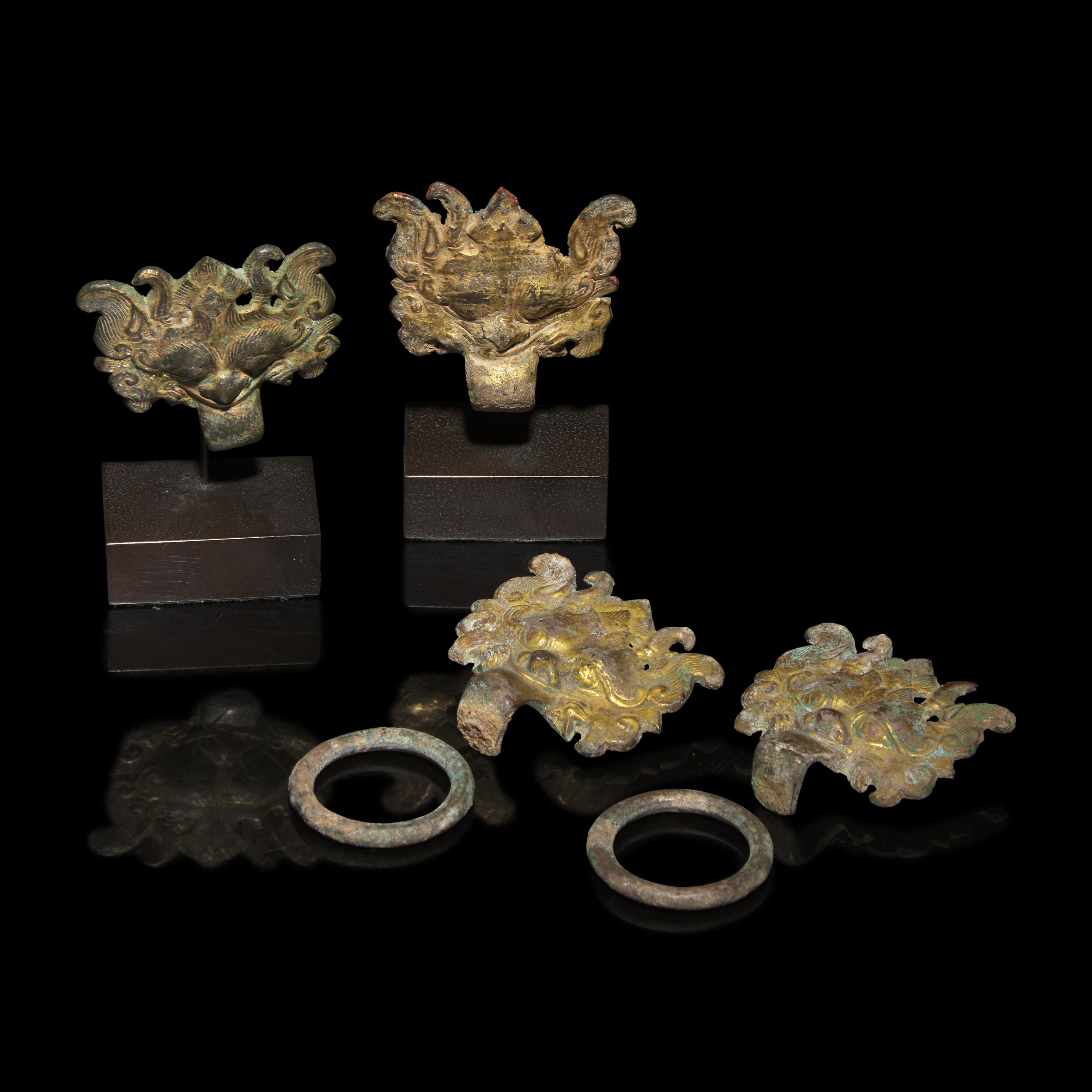 Two Pairs of Chinese Gilt Bronze 'Taotie Mask' Fittings, Han-Six Dynasties — 漢-六朝 銅鎏金饕餮紋輔首兩對