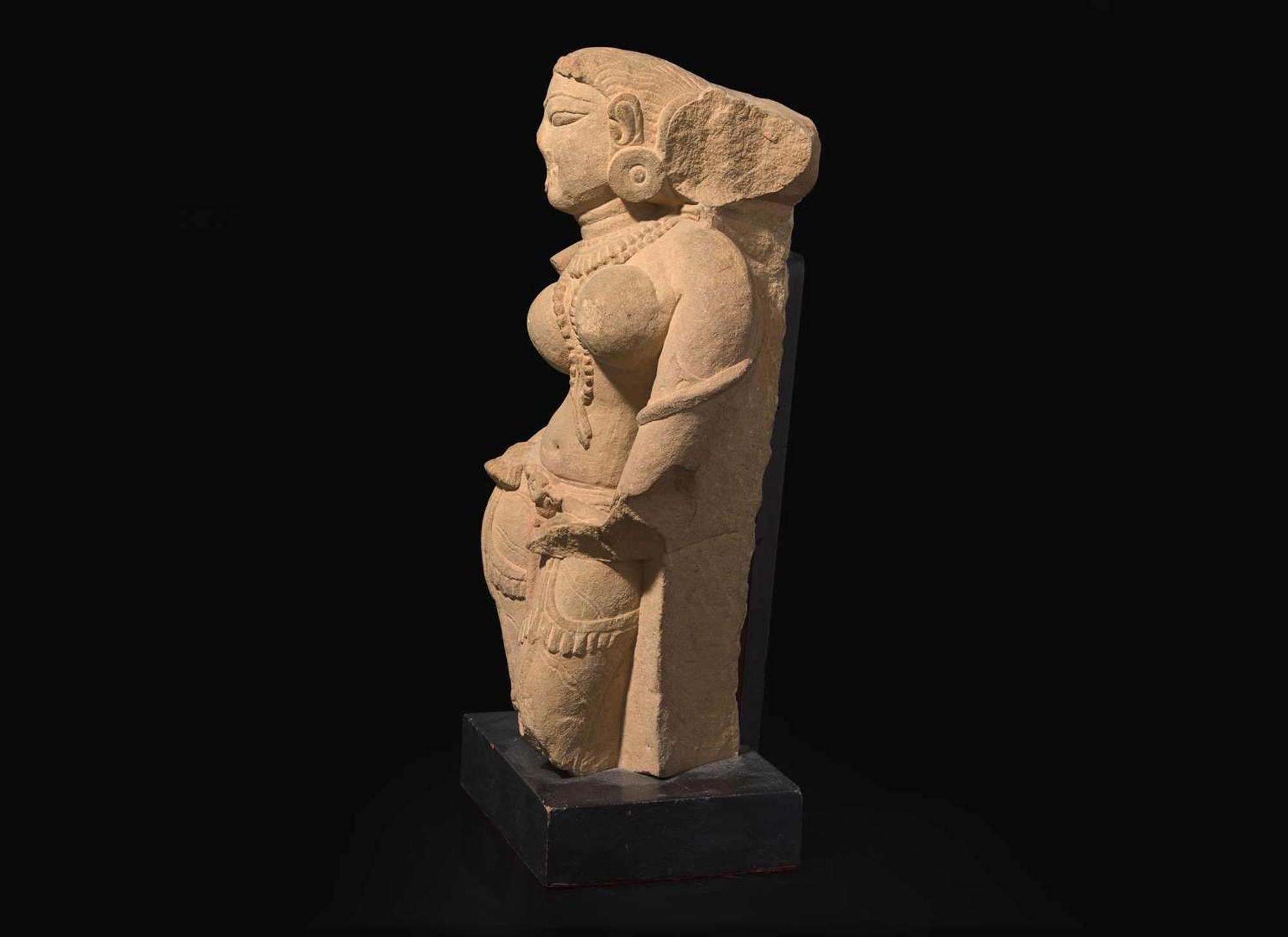 An Indian carved sandstone figure of a celestial maiden, Madhya Pradesh, 11th-12th century 印度砂岩神像 十一或十二世紀