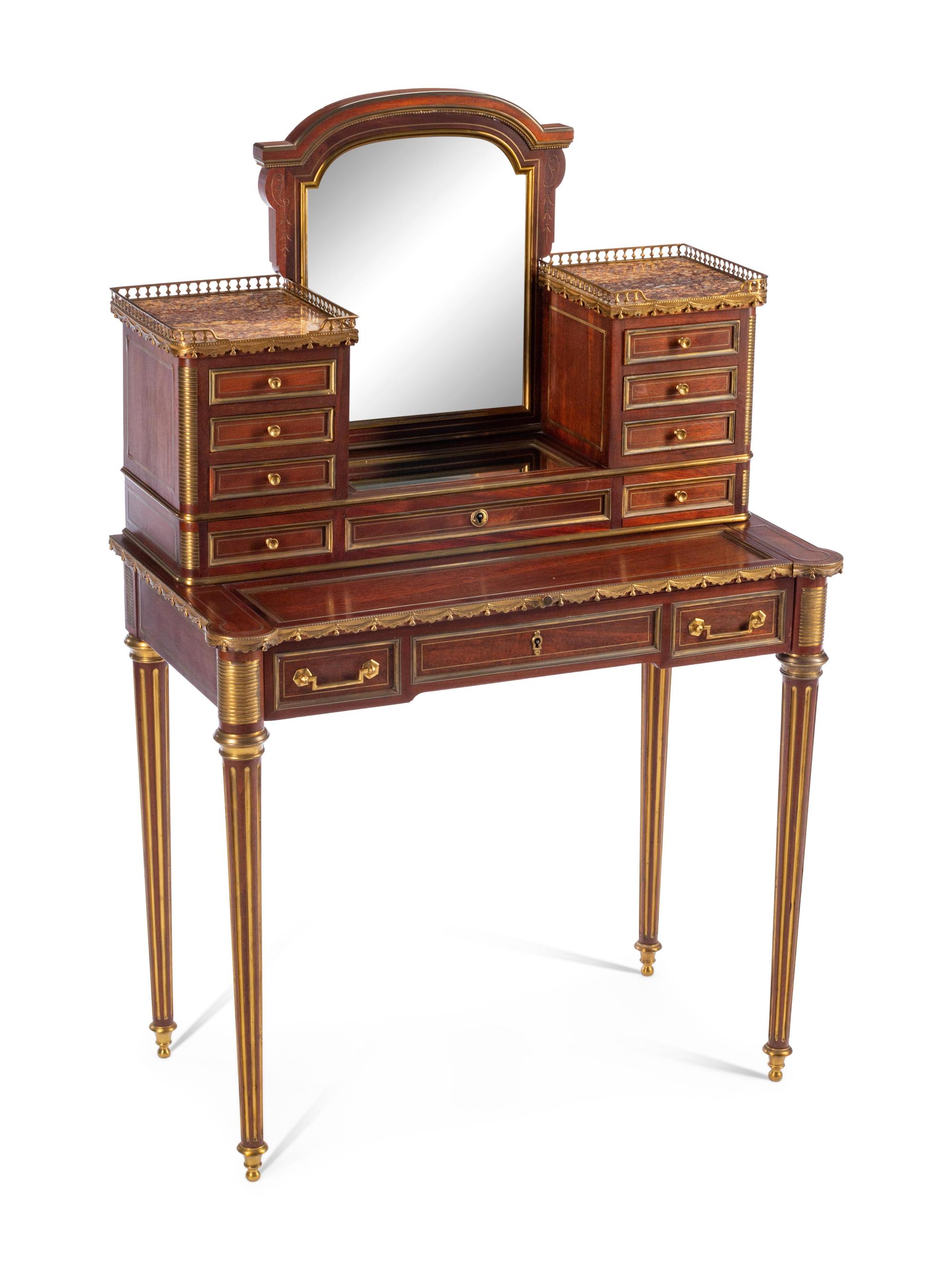 A Louis XVI Style Gilt Bronze Mounted Mahogany Bonheur du Jour