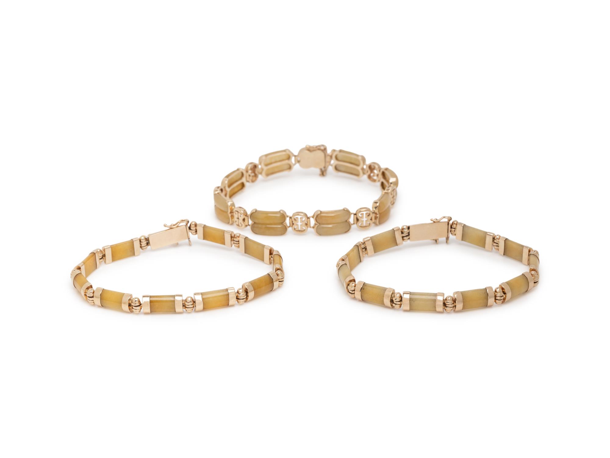 COLLECTION OF JADE AND YELLOW GOLD JEWELRY