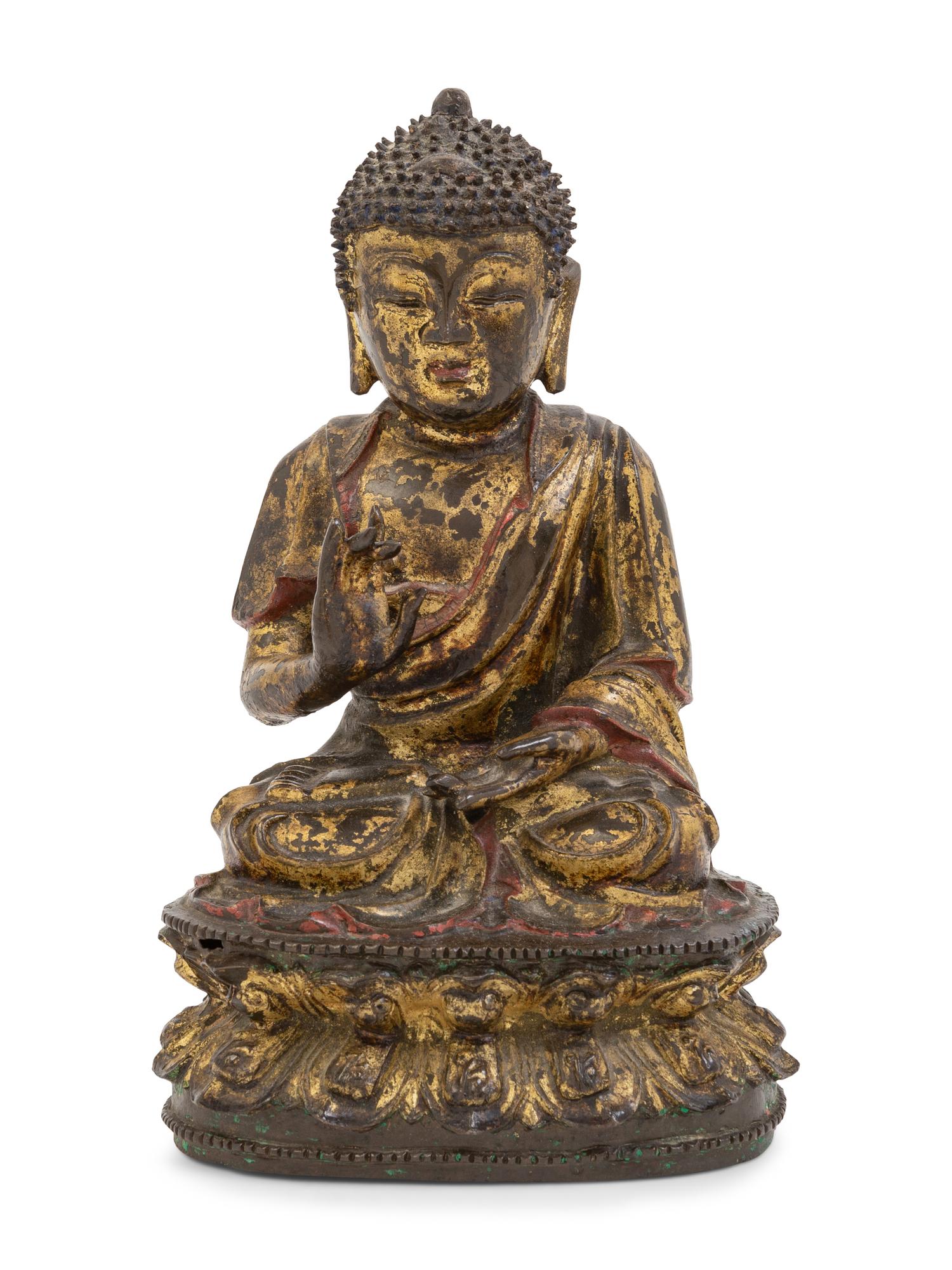 A Chinese Parcel-Gilt and Painted Bronze Figure of Seated Buddha Shakyamuni