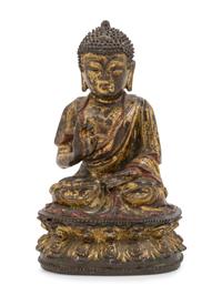A Chinese Parcel-Gilt and Painted Bronze Figure of Seated Buddha Shakyamuni