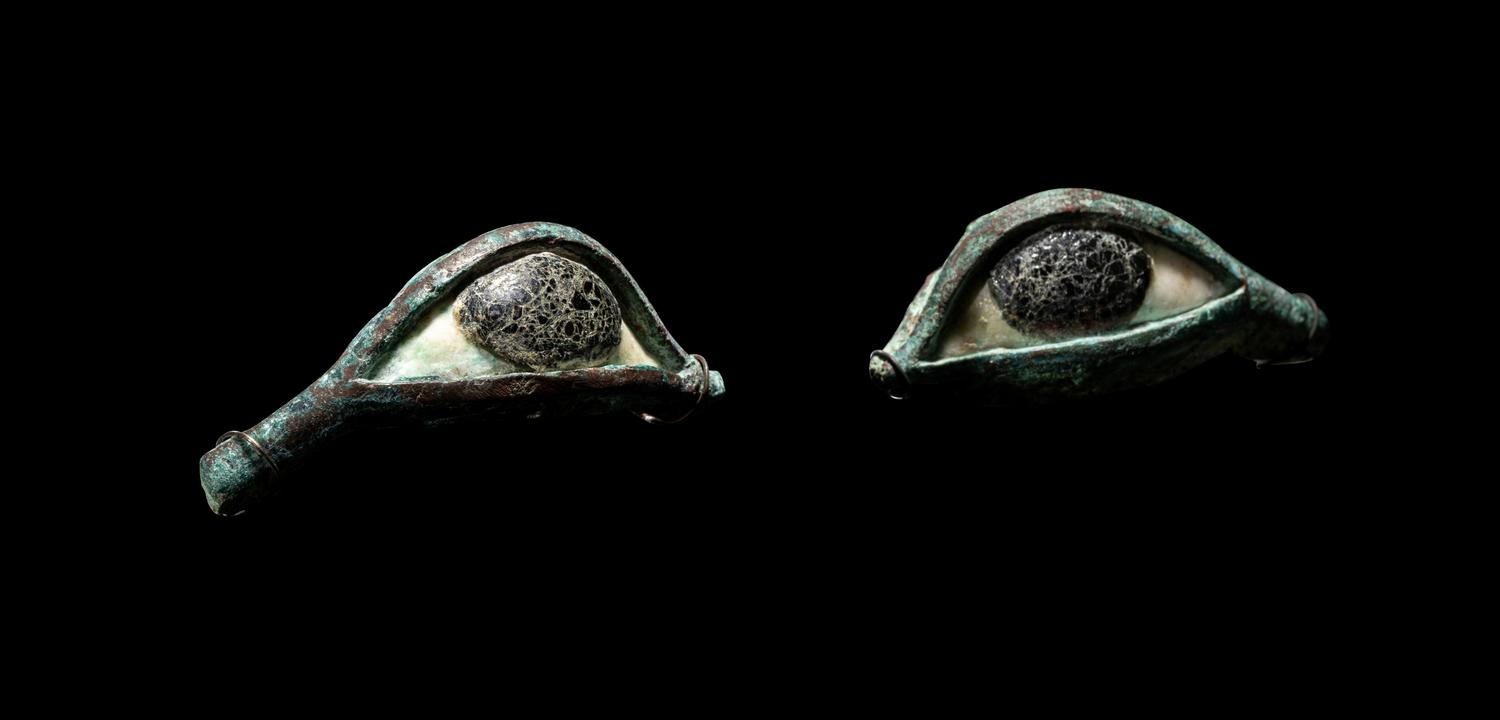 A Pair of Egyptian Bronze, Limestone, and Glass Eye Inlays