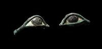 A Pair of Egyptian Bronze, Limestone, and Glass Eye Inlays
