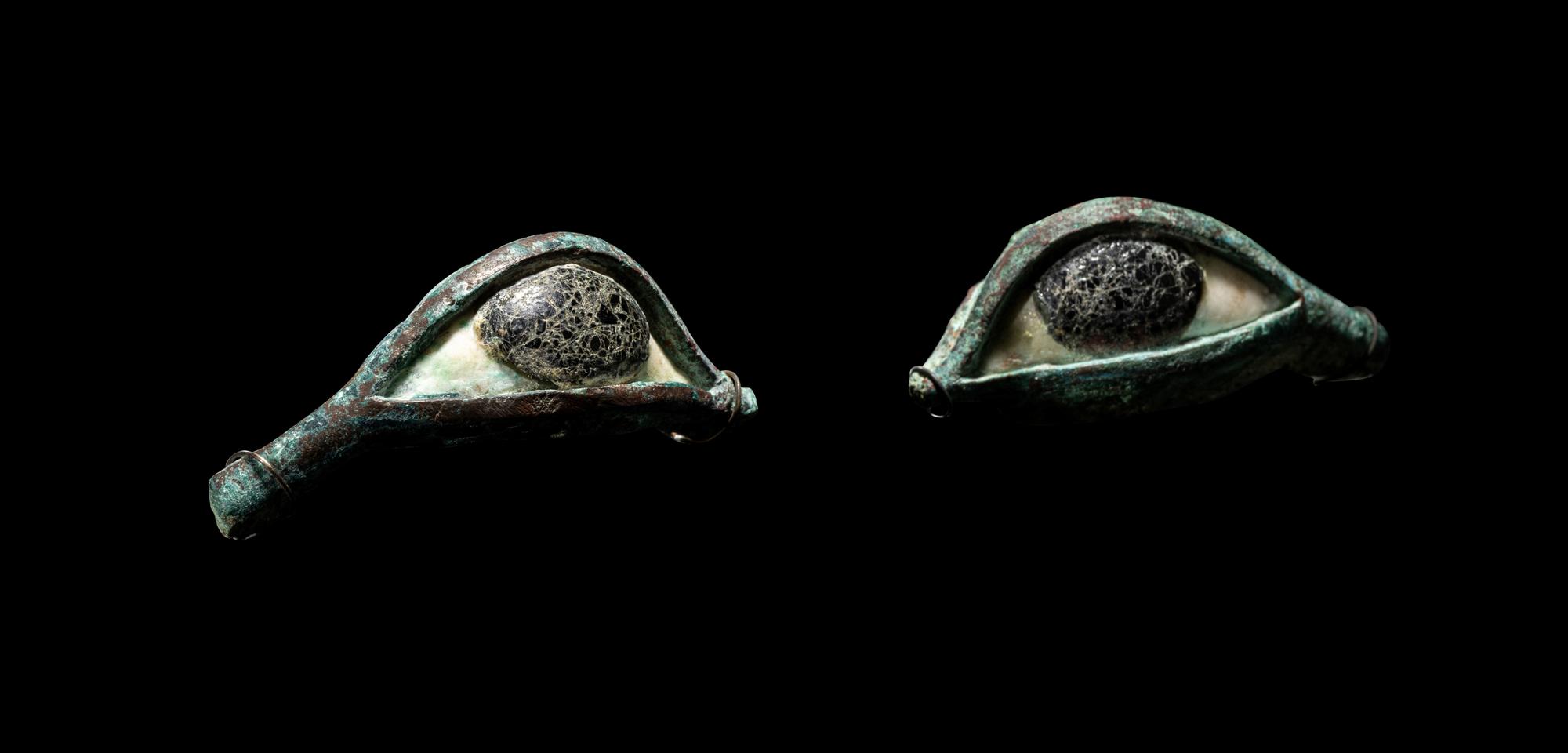 A Pair of Egyptian Bronze, Limestone, and Glass Eye Inlays