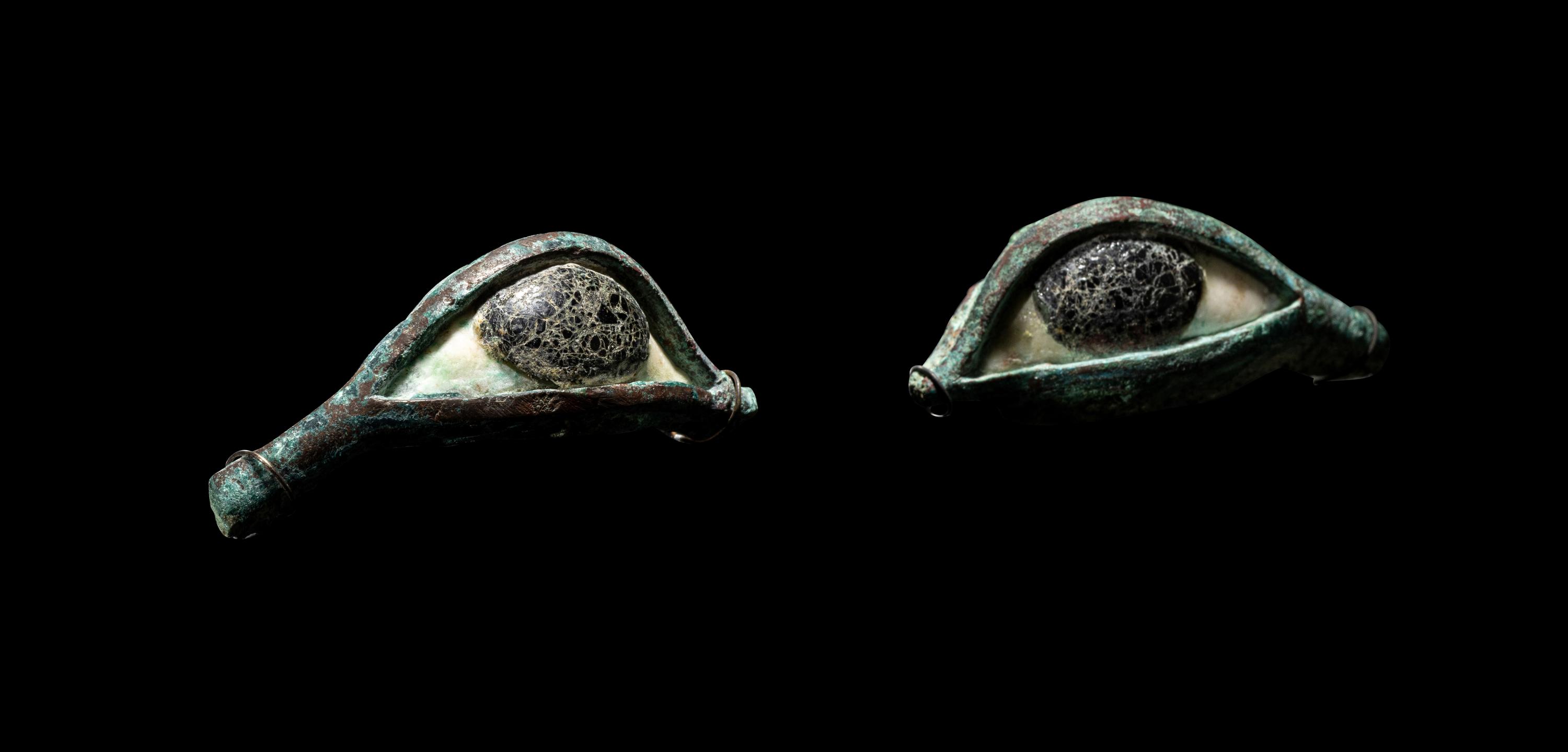 A Pair of Egyptian Bronze, Limestone, and Glass Eye Inlays