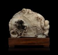 A Carved Jade ‘Elephant and Children’ Figural Group
