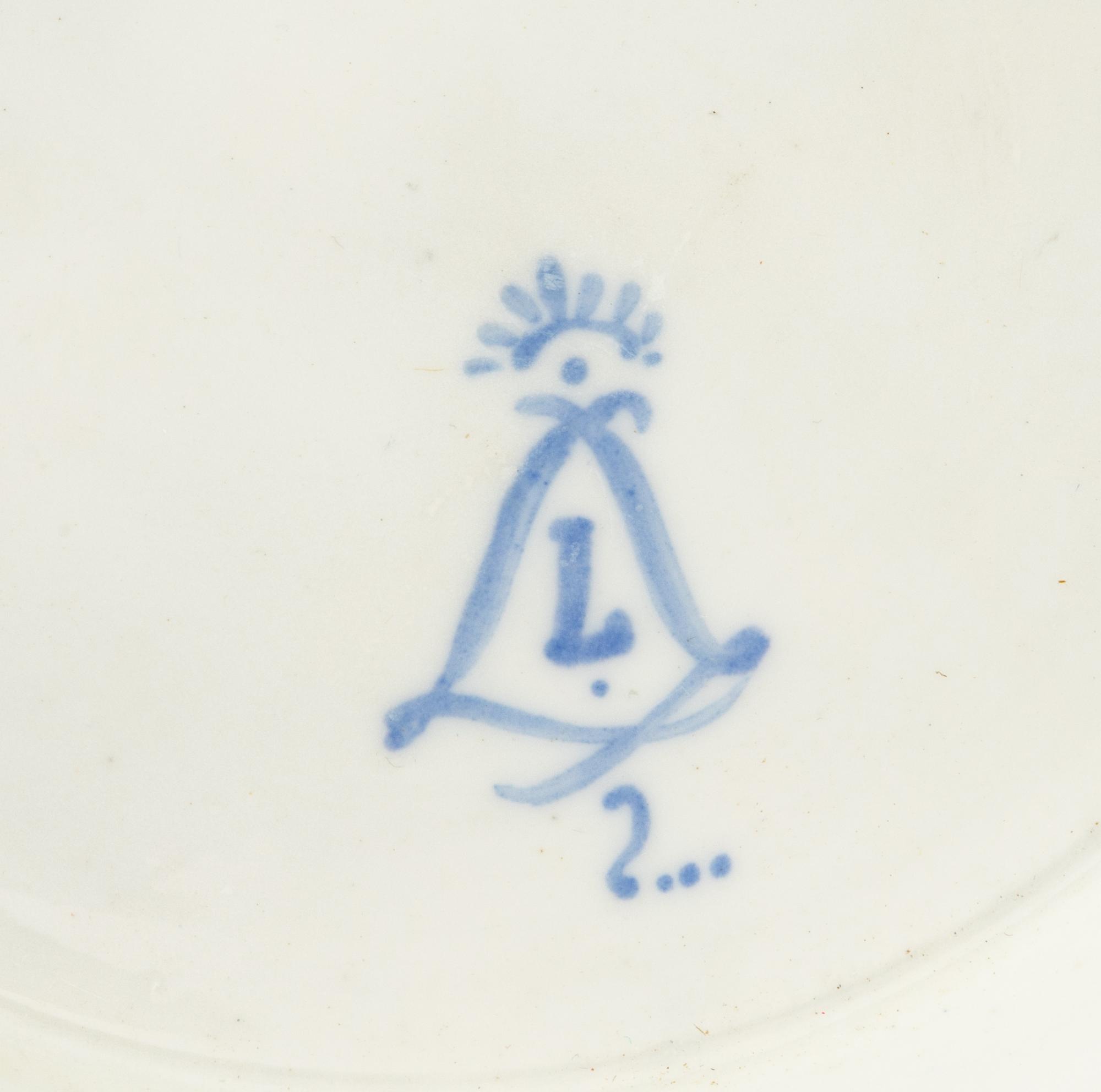 A Pair of Sèvres Style Porcelain Cache Pots