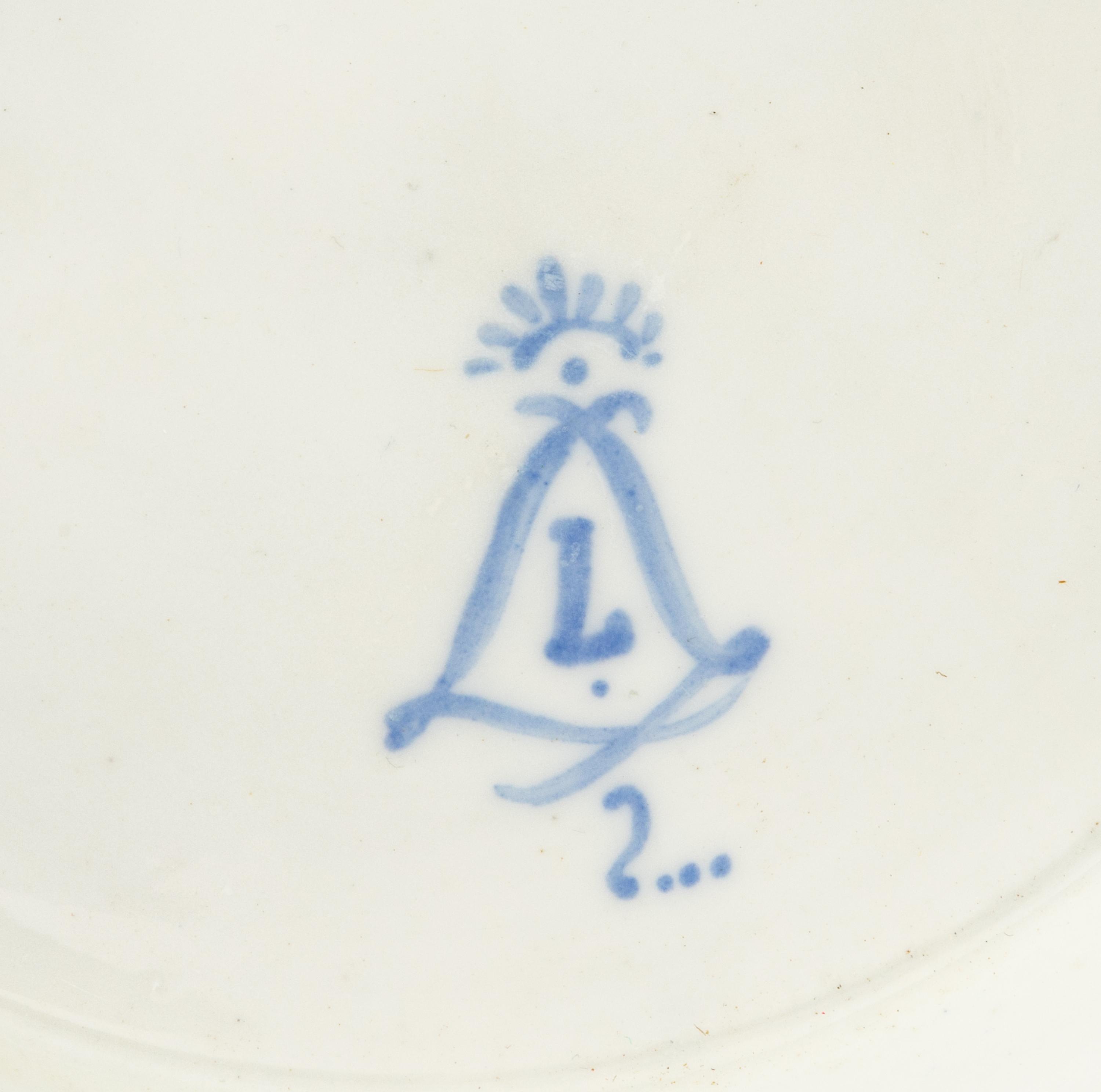 A Pair of Sèvres Style Porcelain Cache Pots