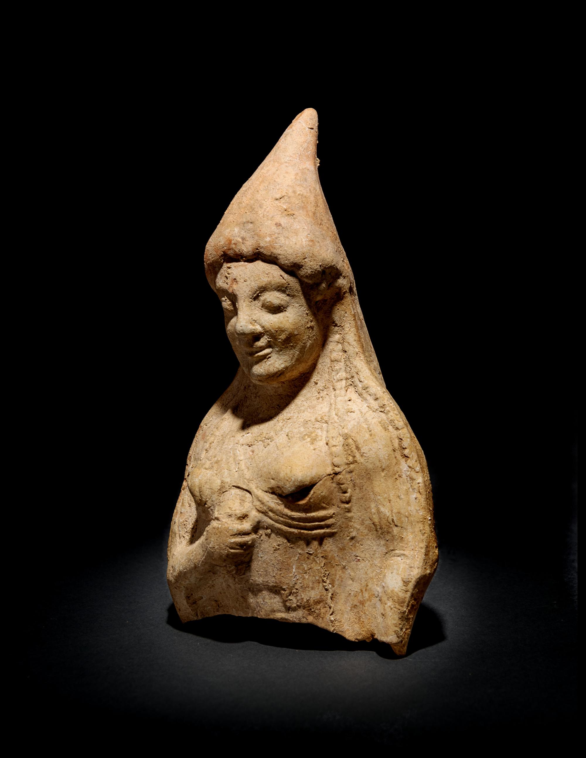 A Greek Terra Cotta Fragmentary Female Figure