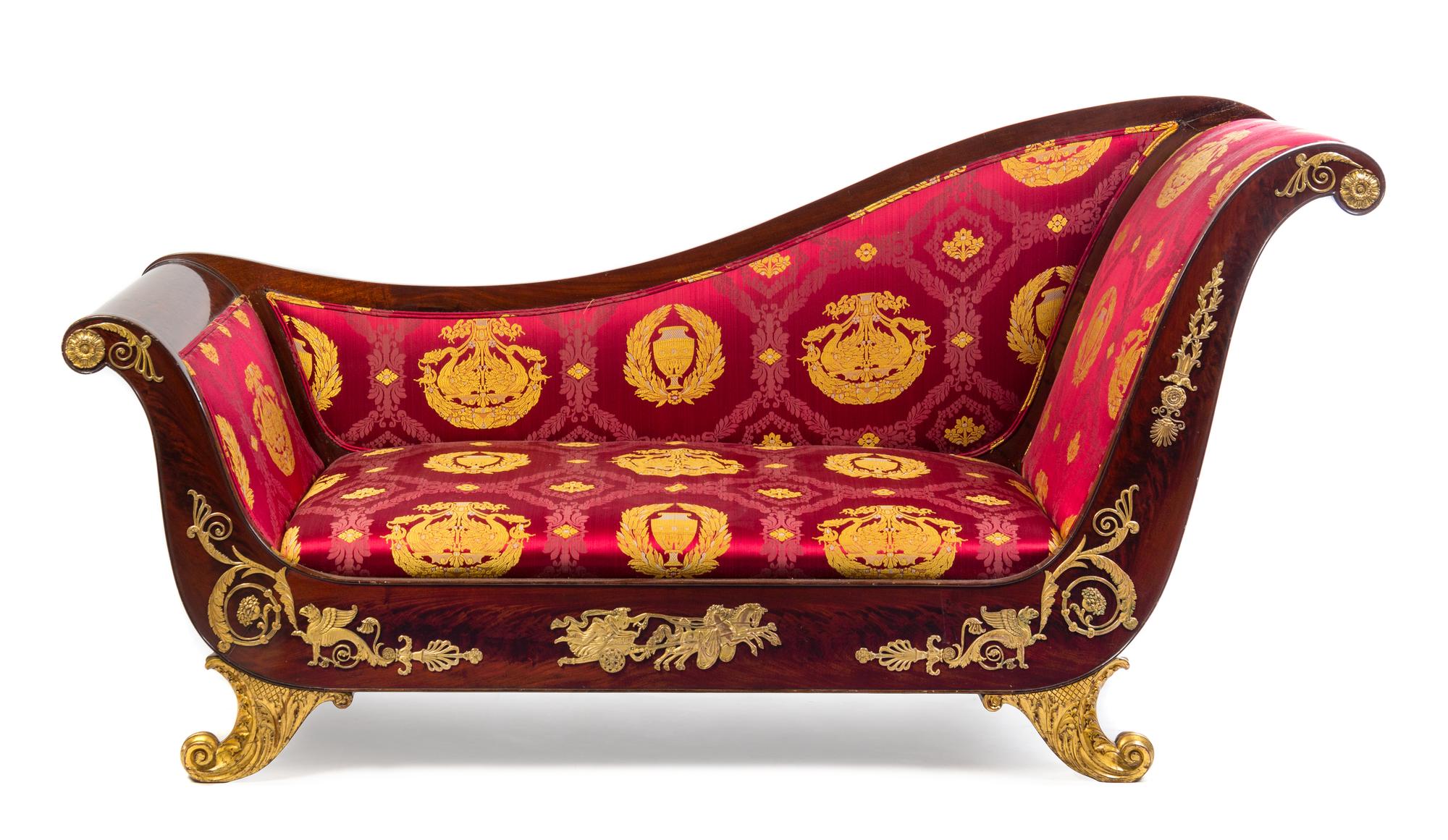 An Empire Gilt Bronze Mounted Mahogany Lit du Jour Height 41 1/2 x width 83 x depth 26 1/2 inches. — 19TH CENTURY