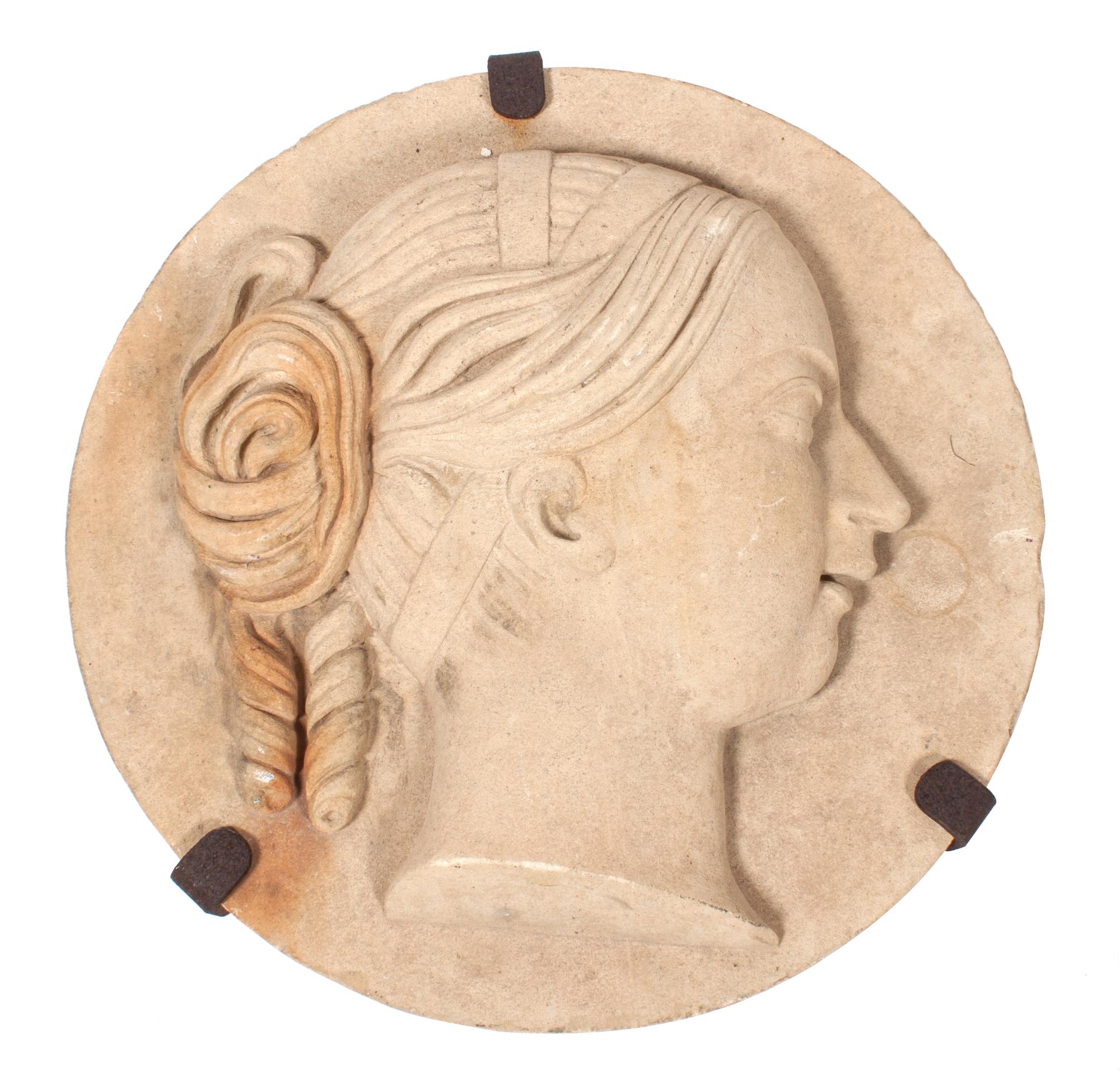 A Carved Stone Medallion Diameter 18 inches. — 20TH CENTURY