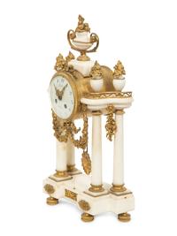 An Empire Style Gilt Bronze Mounted Marble Portico Clock