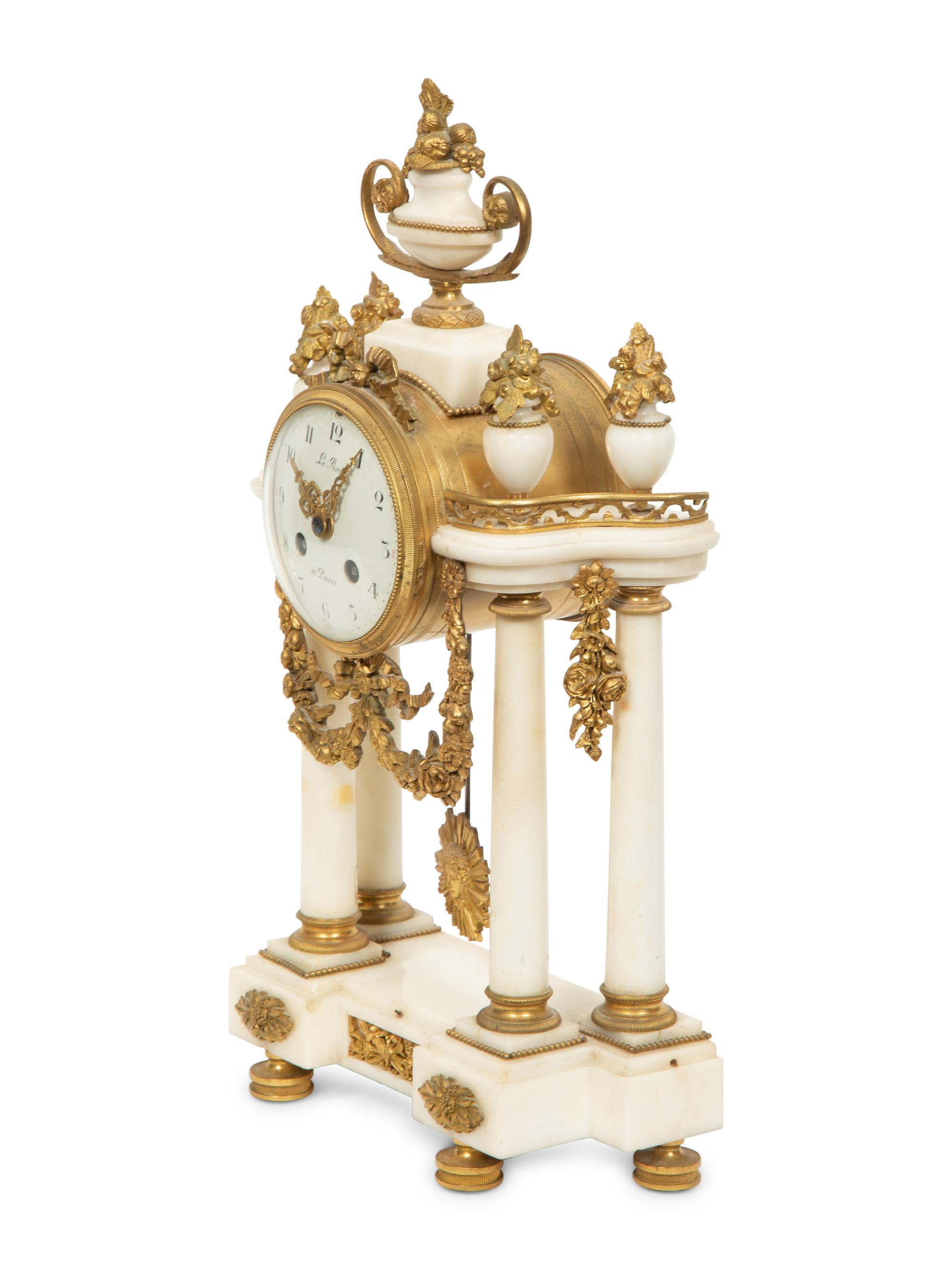An Empire Style Gilt Bronze Mounted Marble Portico Clock
