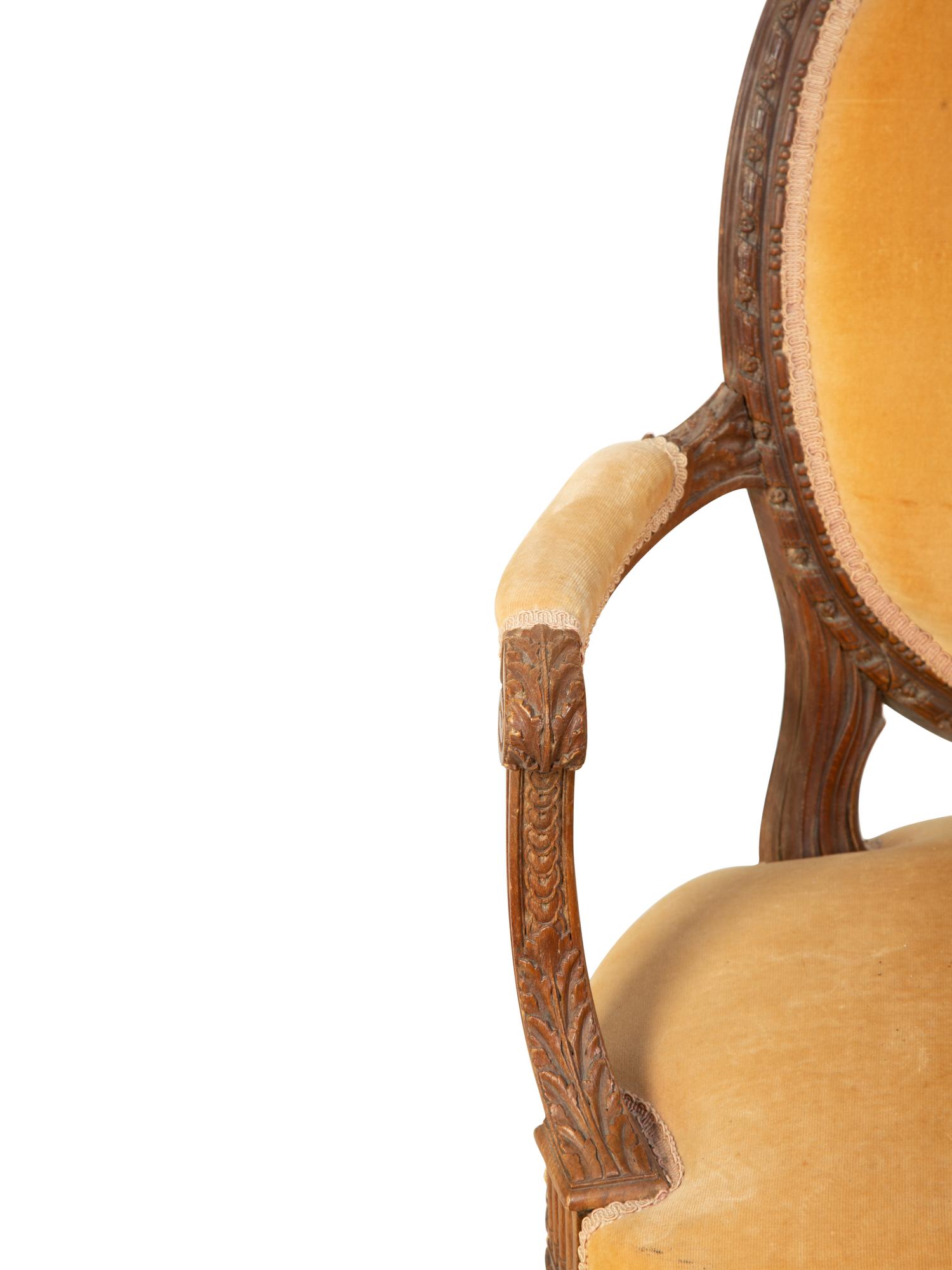 A Louis XVI Style Carved Fruitwood Fauteuil — EARLY 19TH CENTURY
