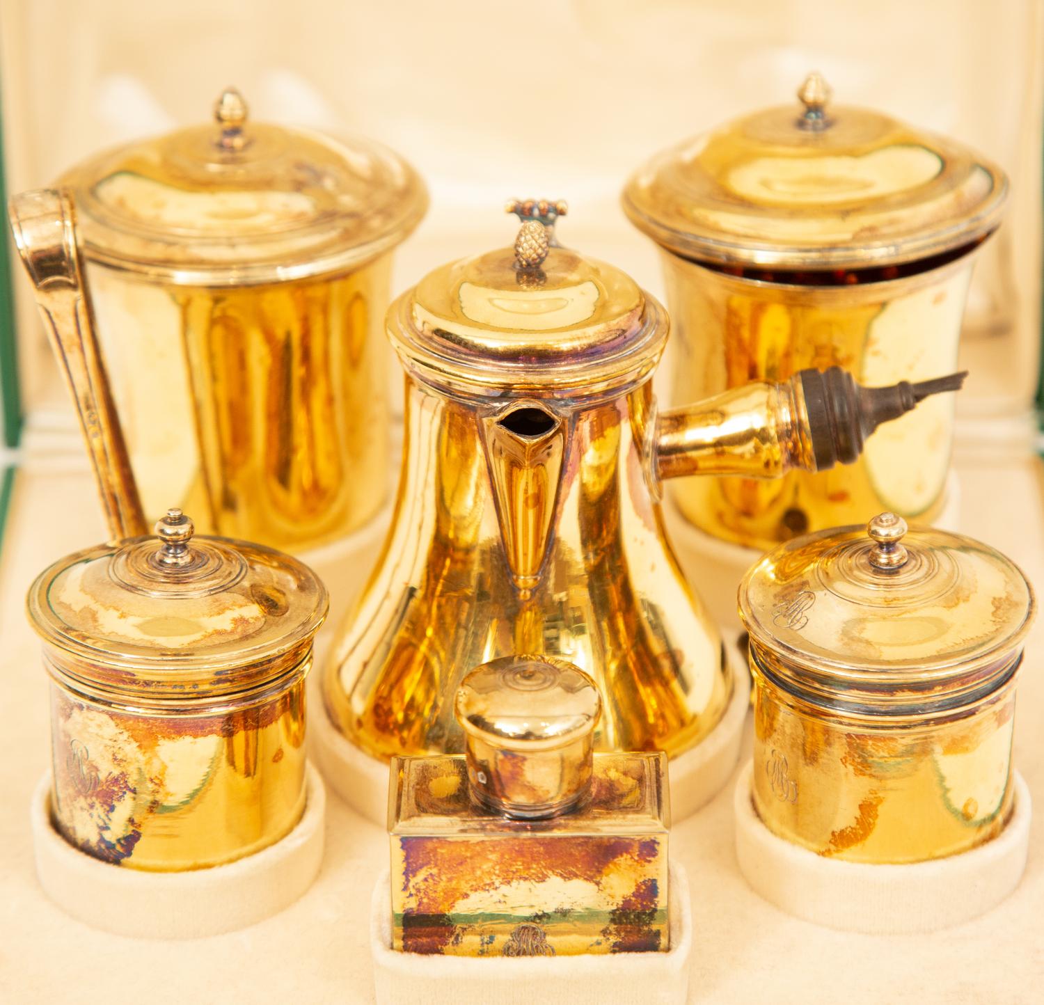 A French Silver-Gilt Six-Piece Chocolate Service